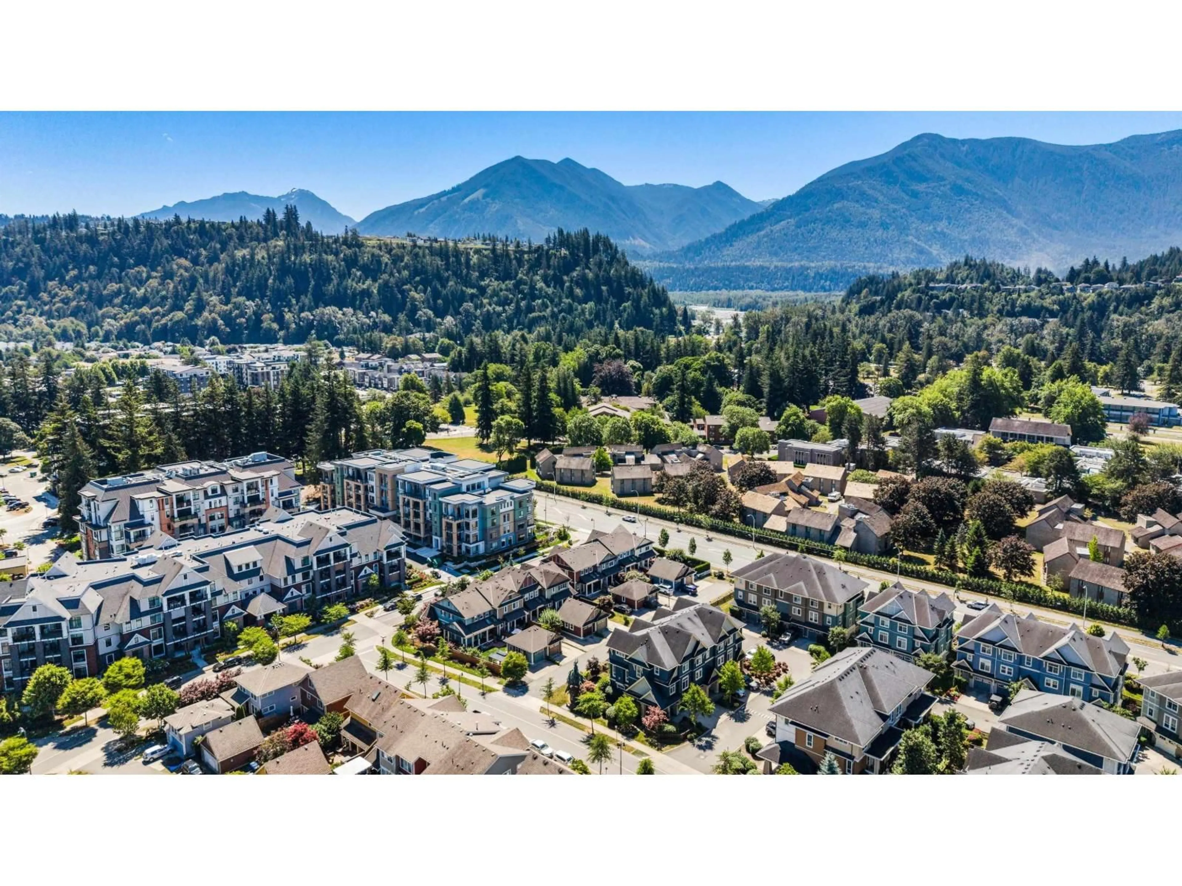A pic from outside/outdoor area/front of a property/back of a property/a pic from drone, mountain view for 42 - 45290 SOOWAHLIE CRESCENT, Chilliwack British Columbia V2R0S6