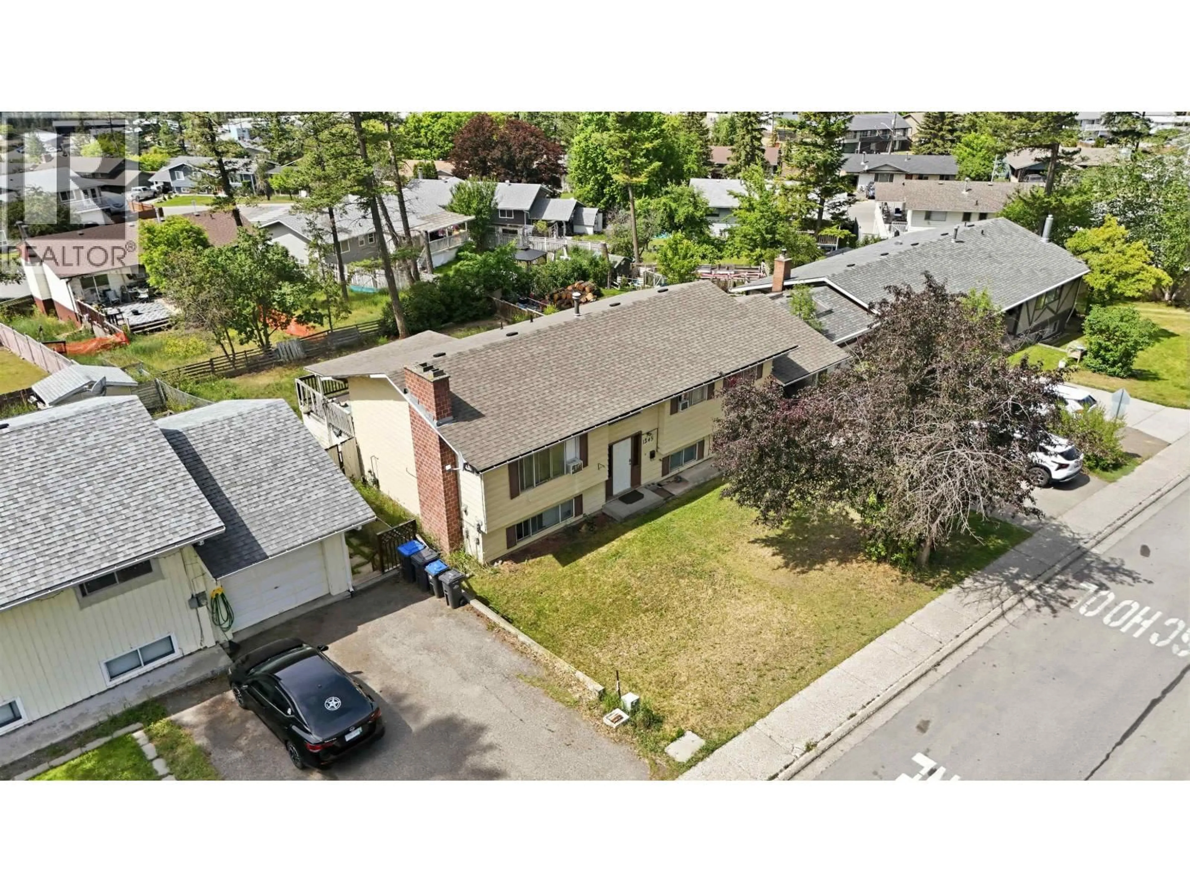 A pic from outside/outdoor area/front of a property/back of a property/a pic from drone, street for 1245 MOON AVENUE, Williams Lake British Columbia V2G1S3