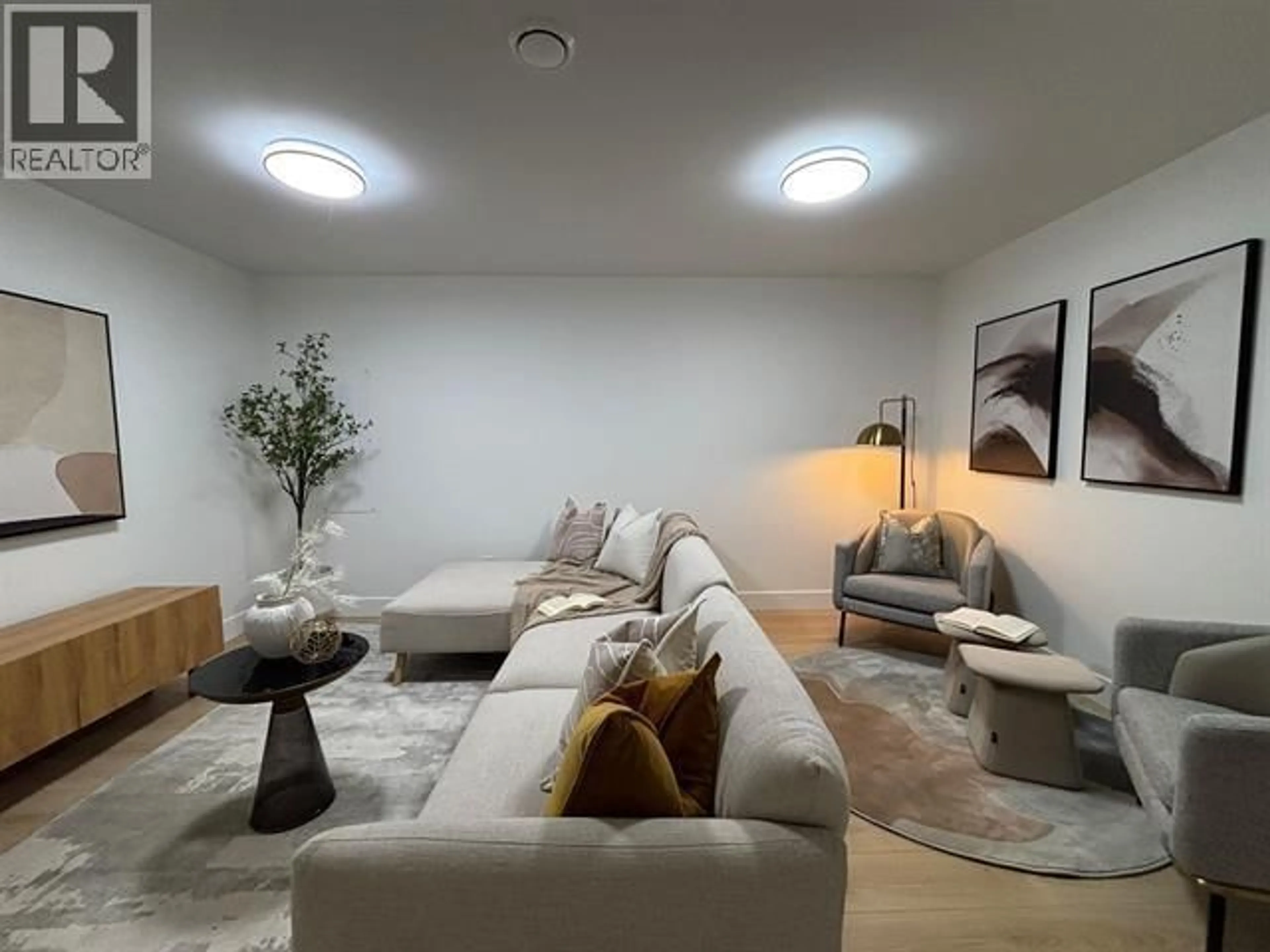 Living room with furniture, unknown for 101 - 957 EDGAR AVENUE, Coquitlam British Columbia V3K2K1