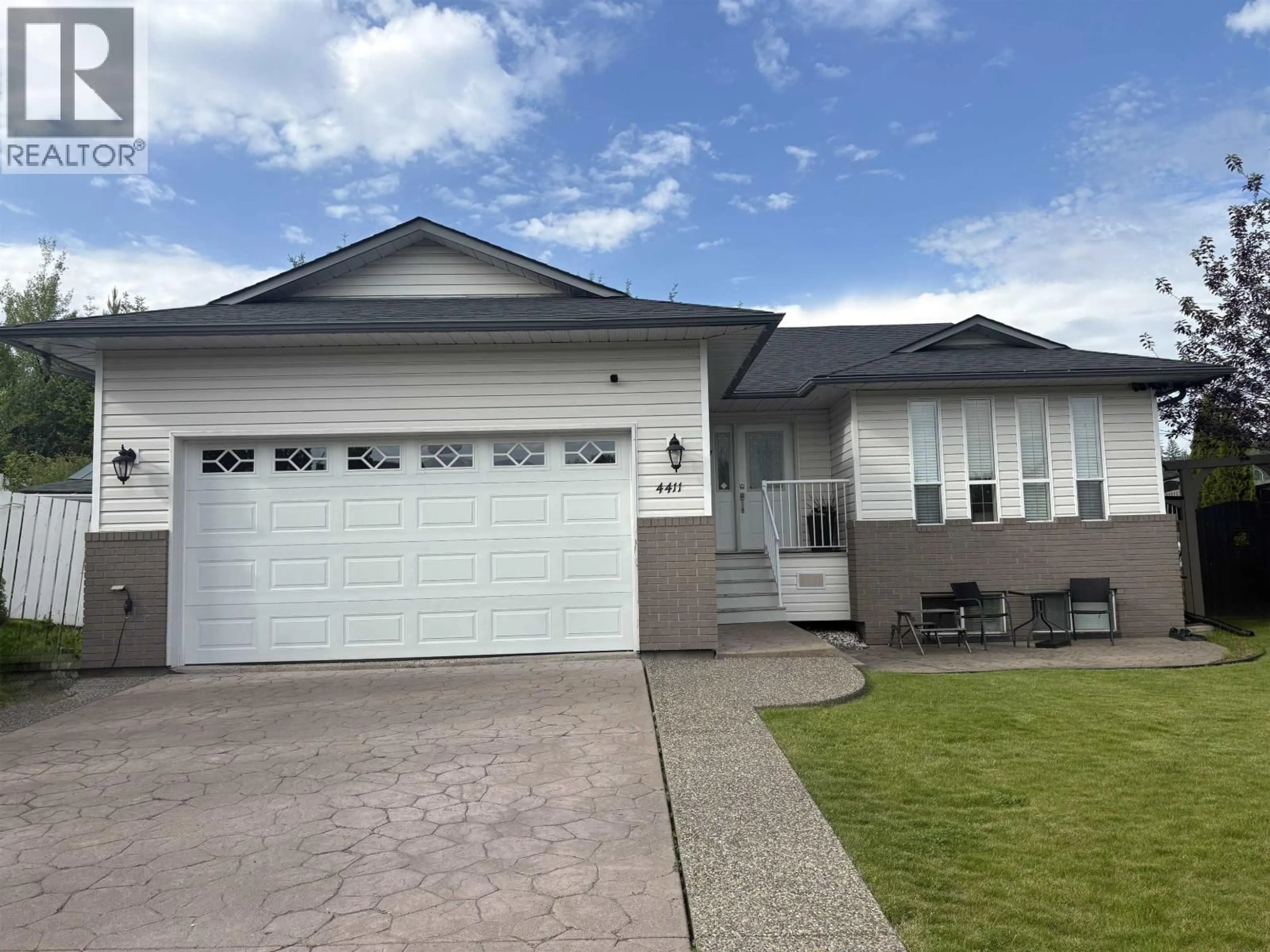 Home with vinyl exterior material, street for 4411 WHEELER ROAD, Prince George British Columbia V2N5H4