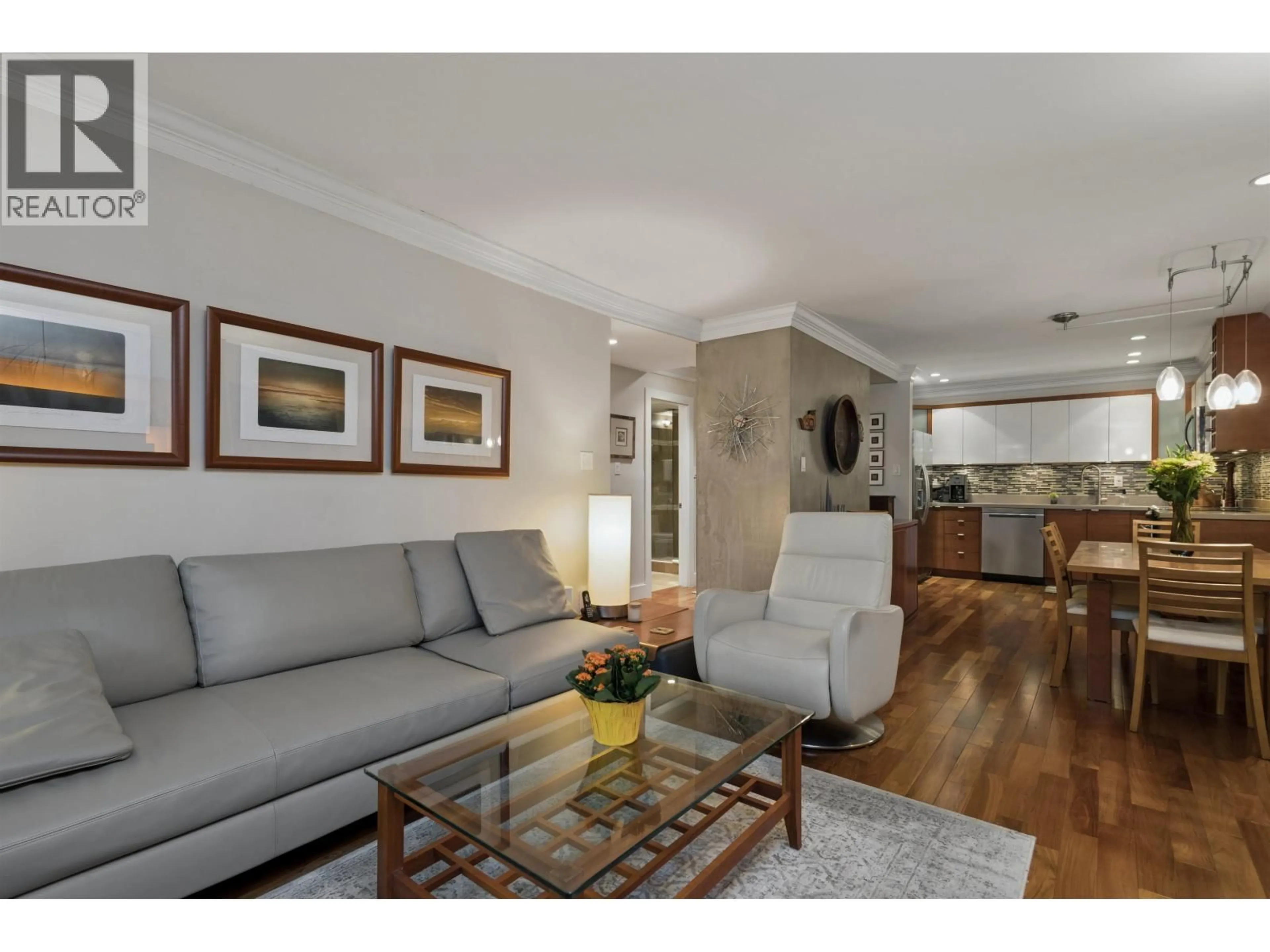 Living room with furniture, wood/laminate floor for 104 - 1855 NELSON STREET, Vancouver British Columbia V6G1M9