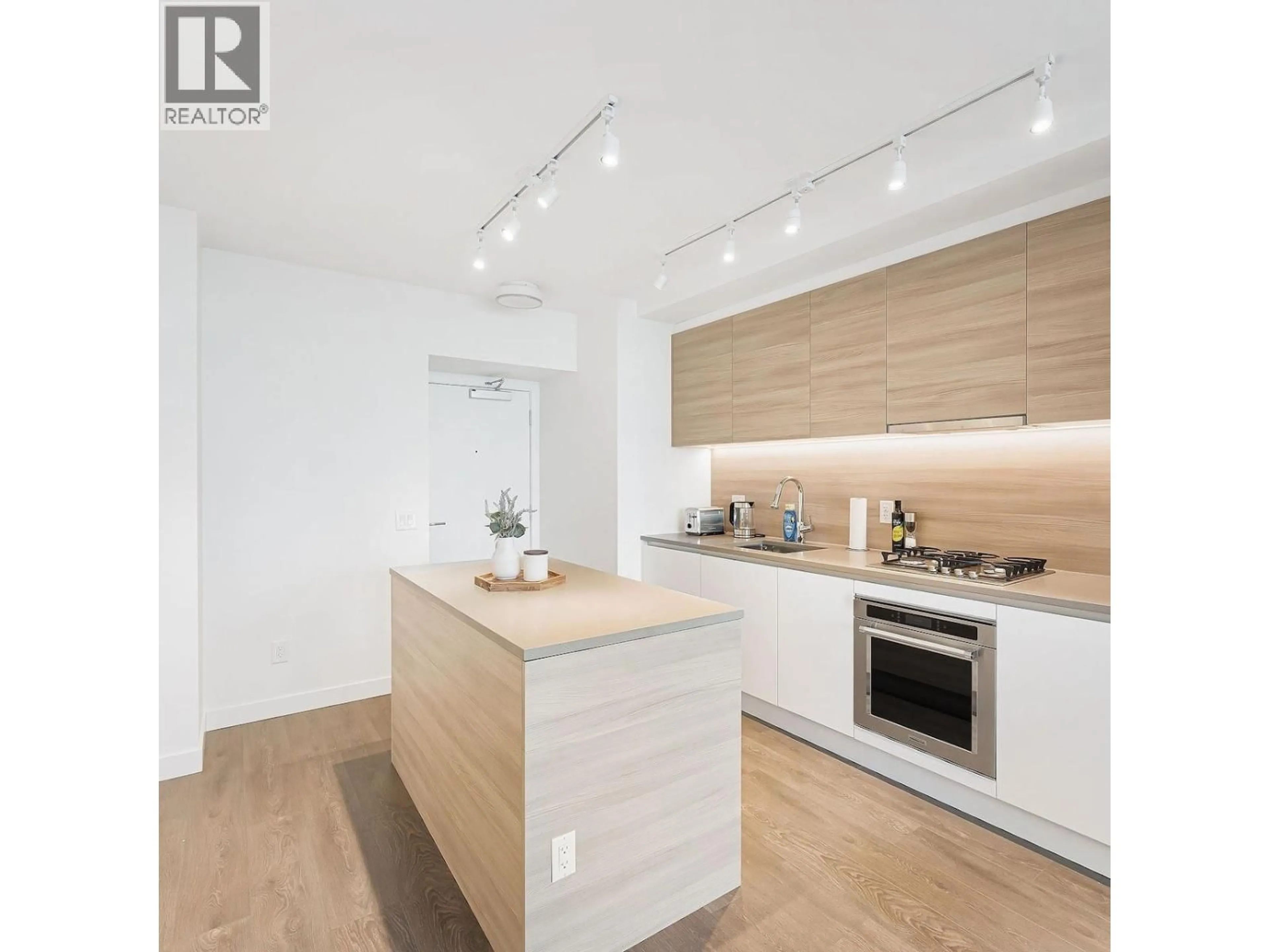 Open concept kitchen, wood/laminate floor for 2306 - 657 WHITING WAY, Coquitlam British Columbia V3J7W9