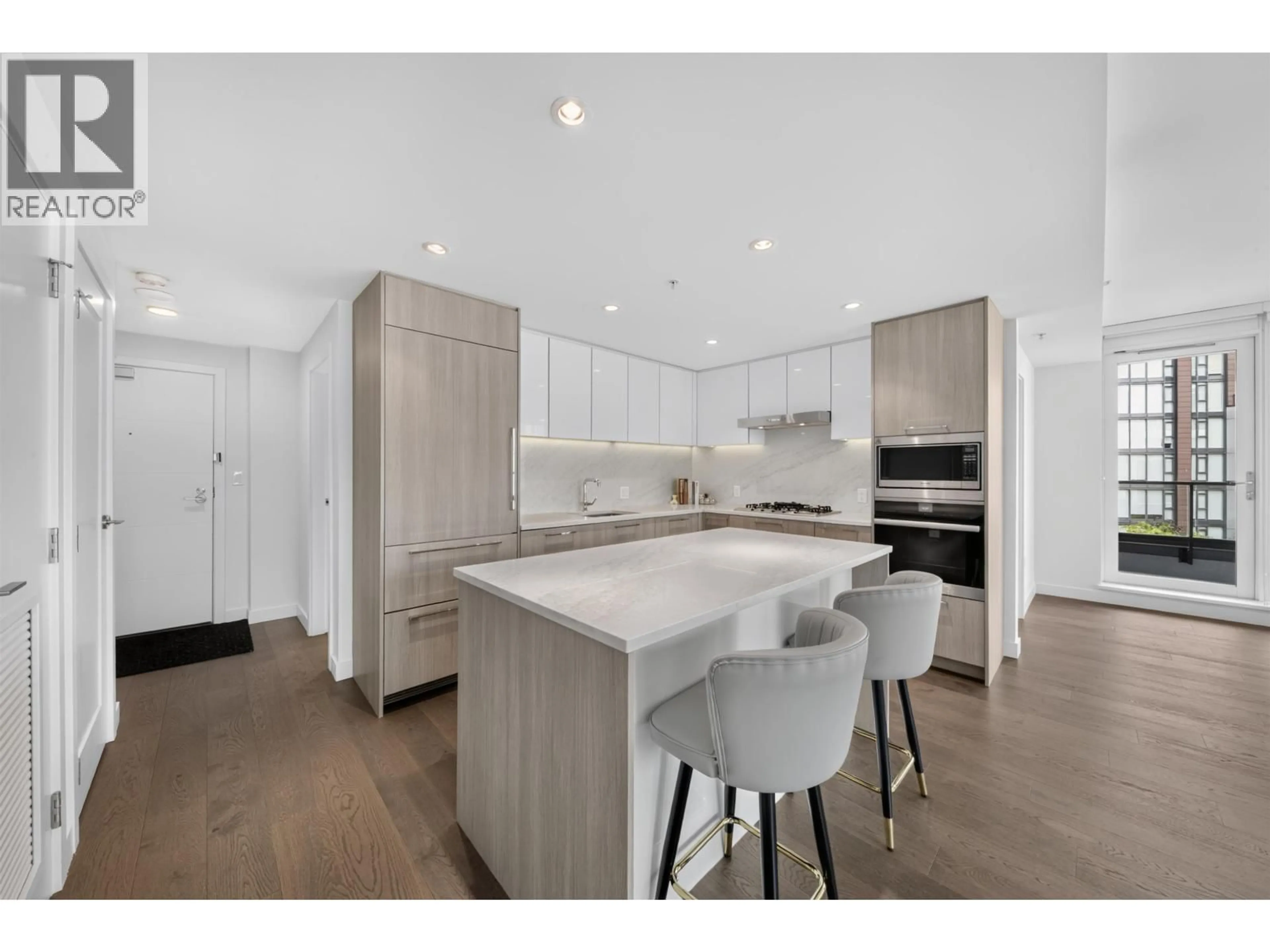 Open concept kitchen, wood/laminate floor for 808 - 8160 MCMYN WAY, Richmond British Columbia V6X0V2