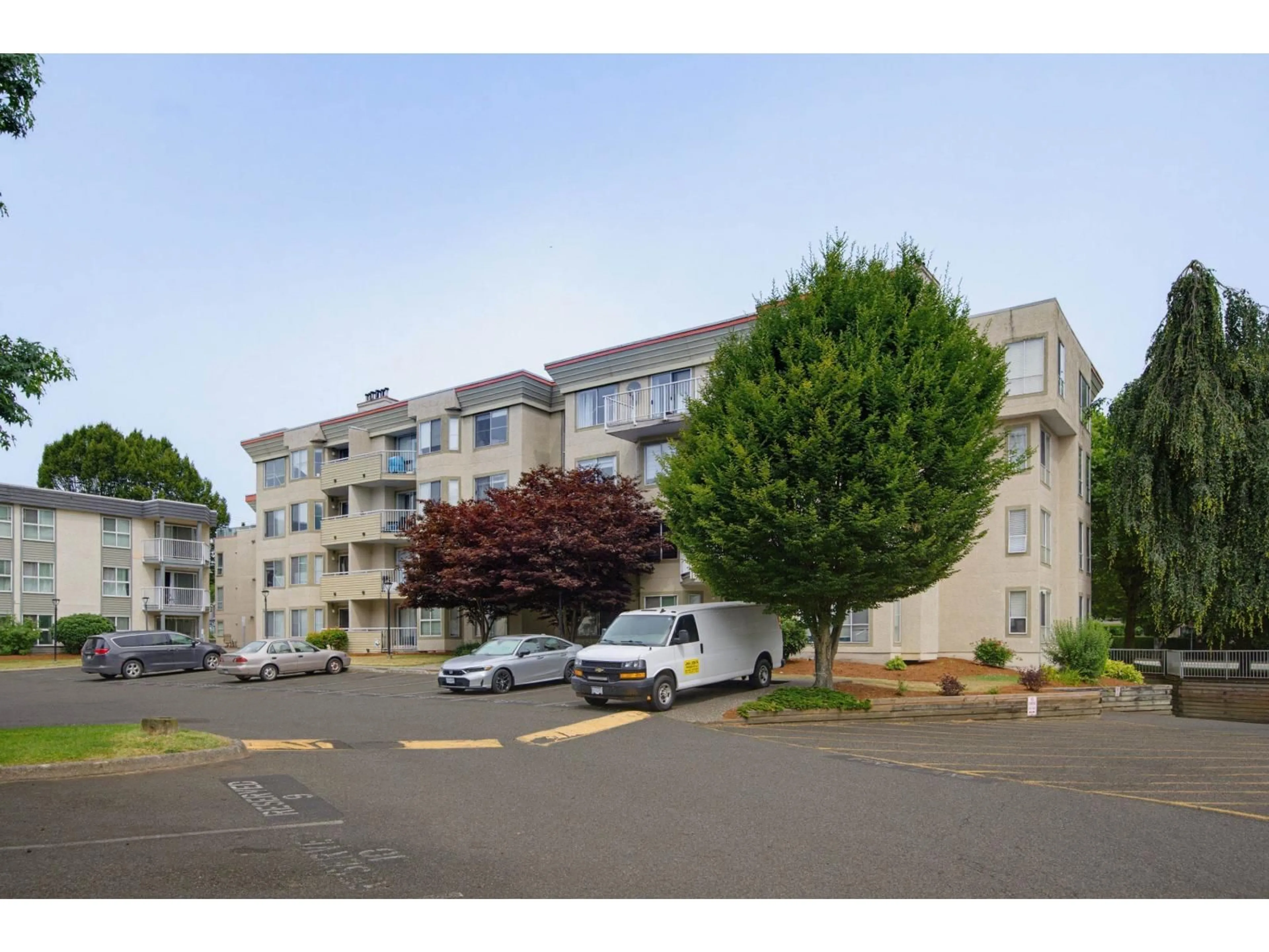 A pic from outside/outdoor area/front of a property/back of a property/a pic from drone, unknown for 438 - 32830 GEORGE FERGUSON WAY, Abbotsford British Columbia V2S7K1