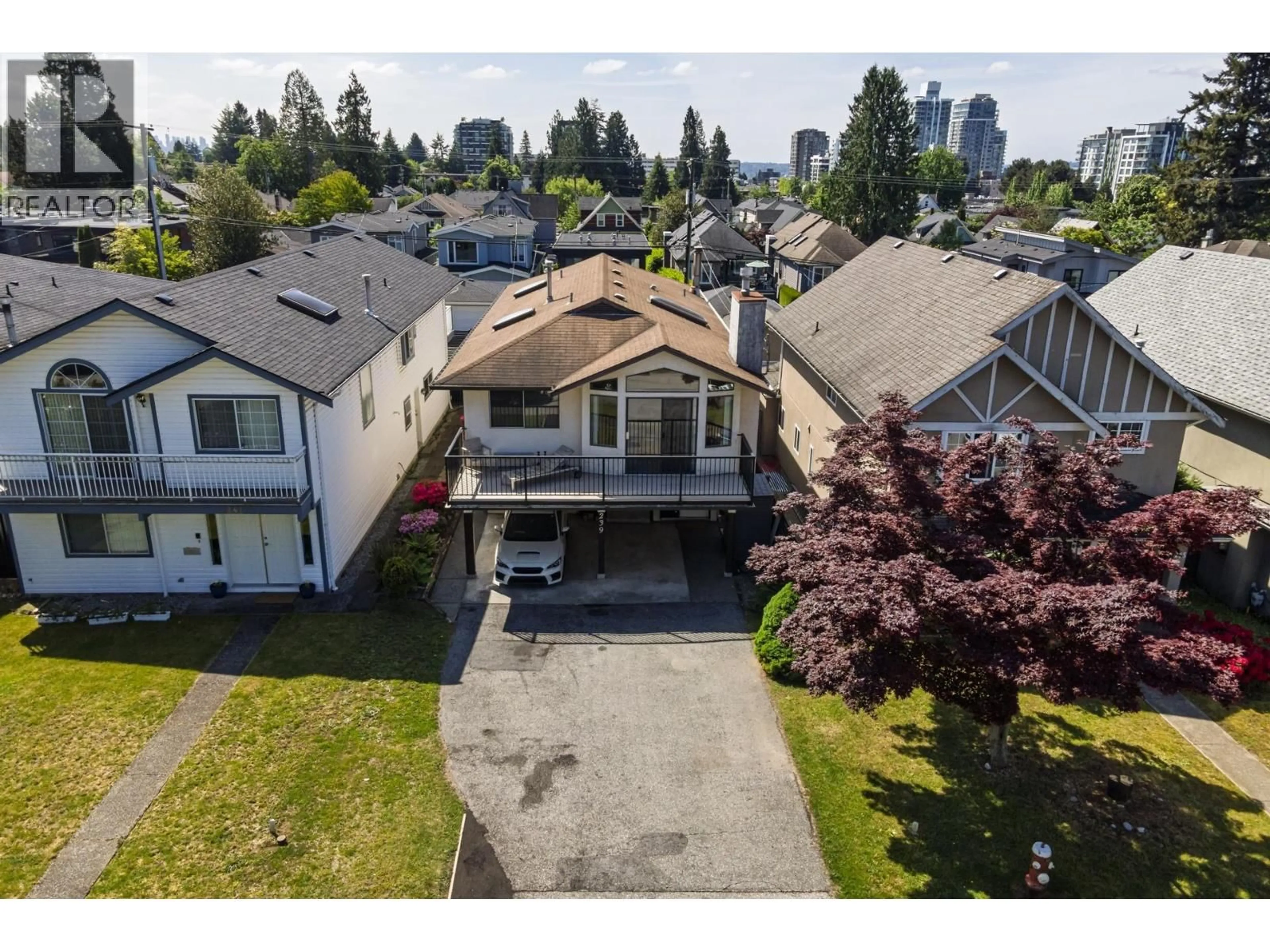 A pic from outside/outdoor area/front of a property/back of a property/a pic from drone, street for 239 20TH STREET, North Vancouver British Columbia V7L3A6