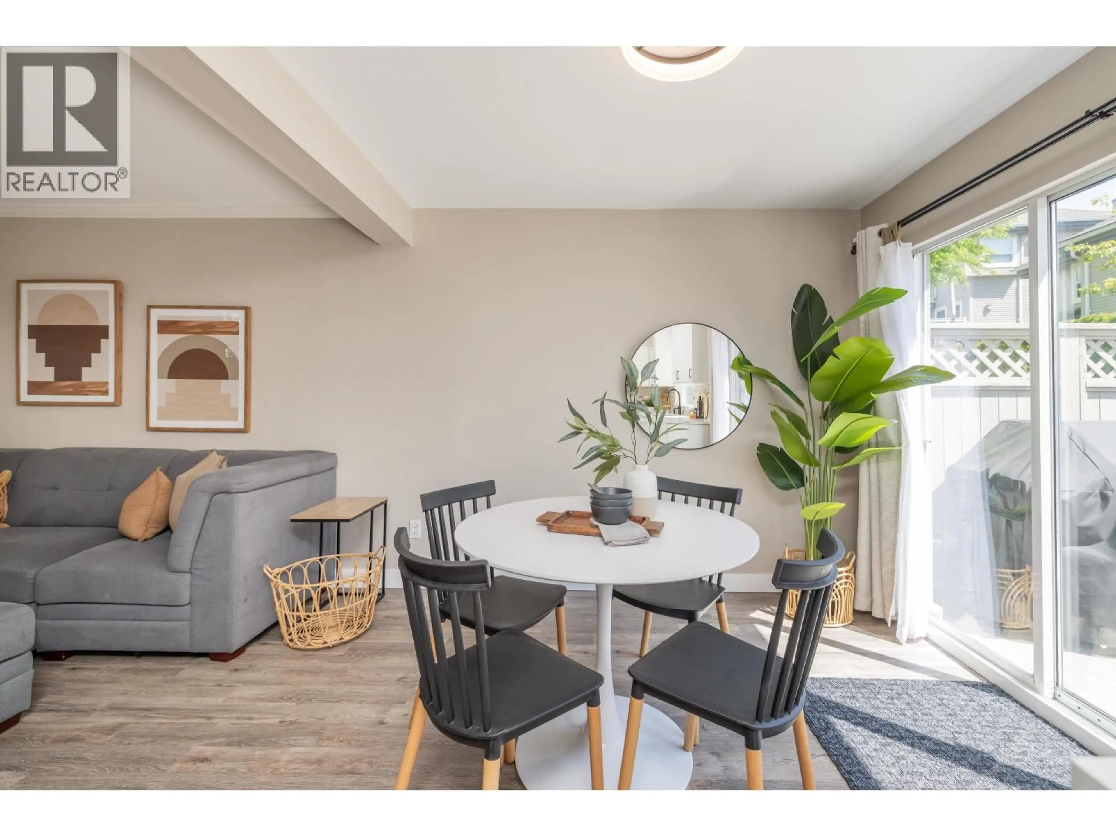Living room with furniture, wood/laminate floor for 863 ROCHE POINT DRIVE, North Vancouver British Columbia V7H2W5