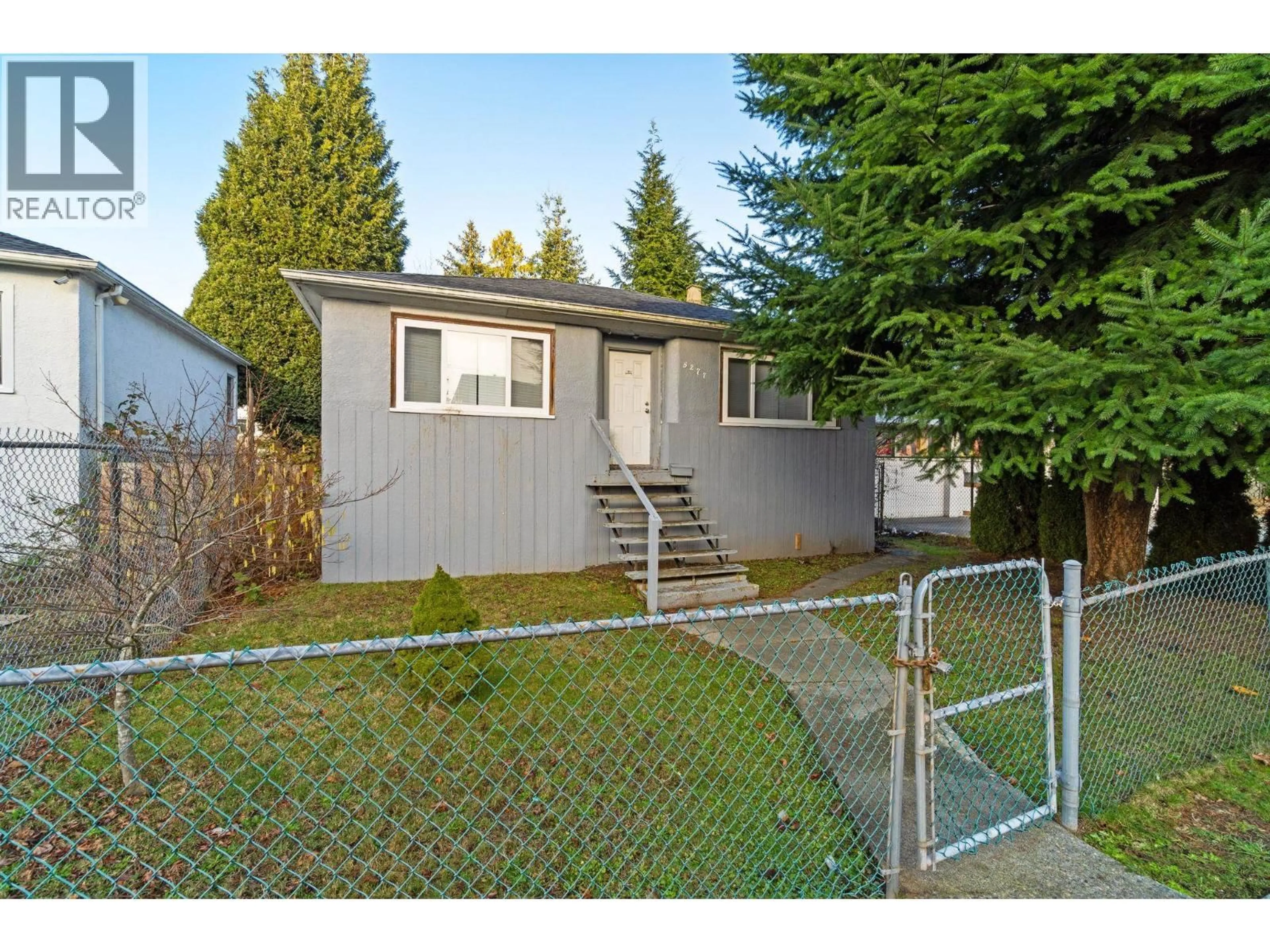 Home with vinyl exterior material, street for 5277 IMPERIAL STREET, Burnaby British Columbia V5J1E5