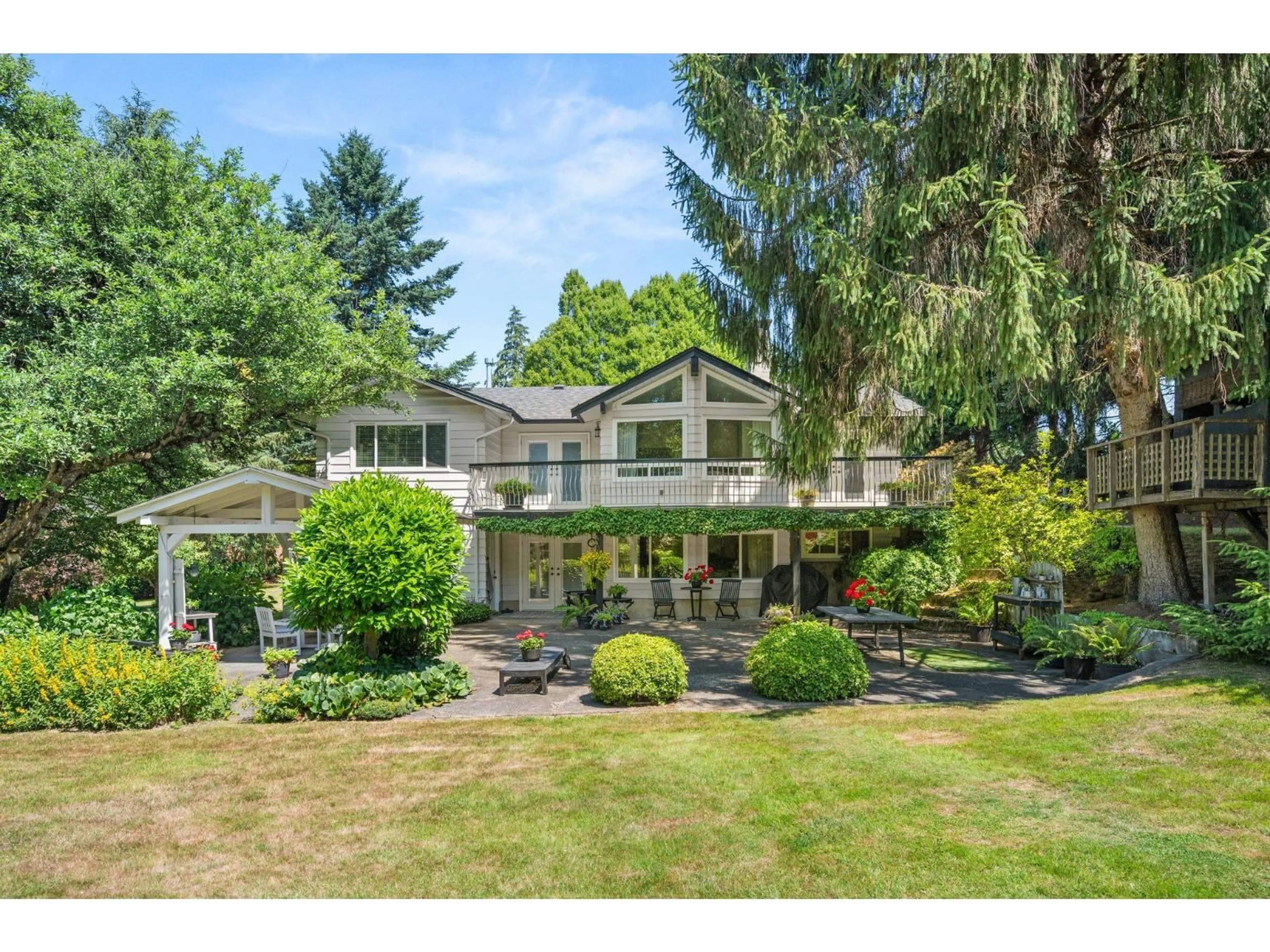 A pic from outside/outdoor area/front of a property/back of a property/a pic from drone, unknown for 23014 70A AVENUE, Langley British Columbia V2Y2J9