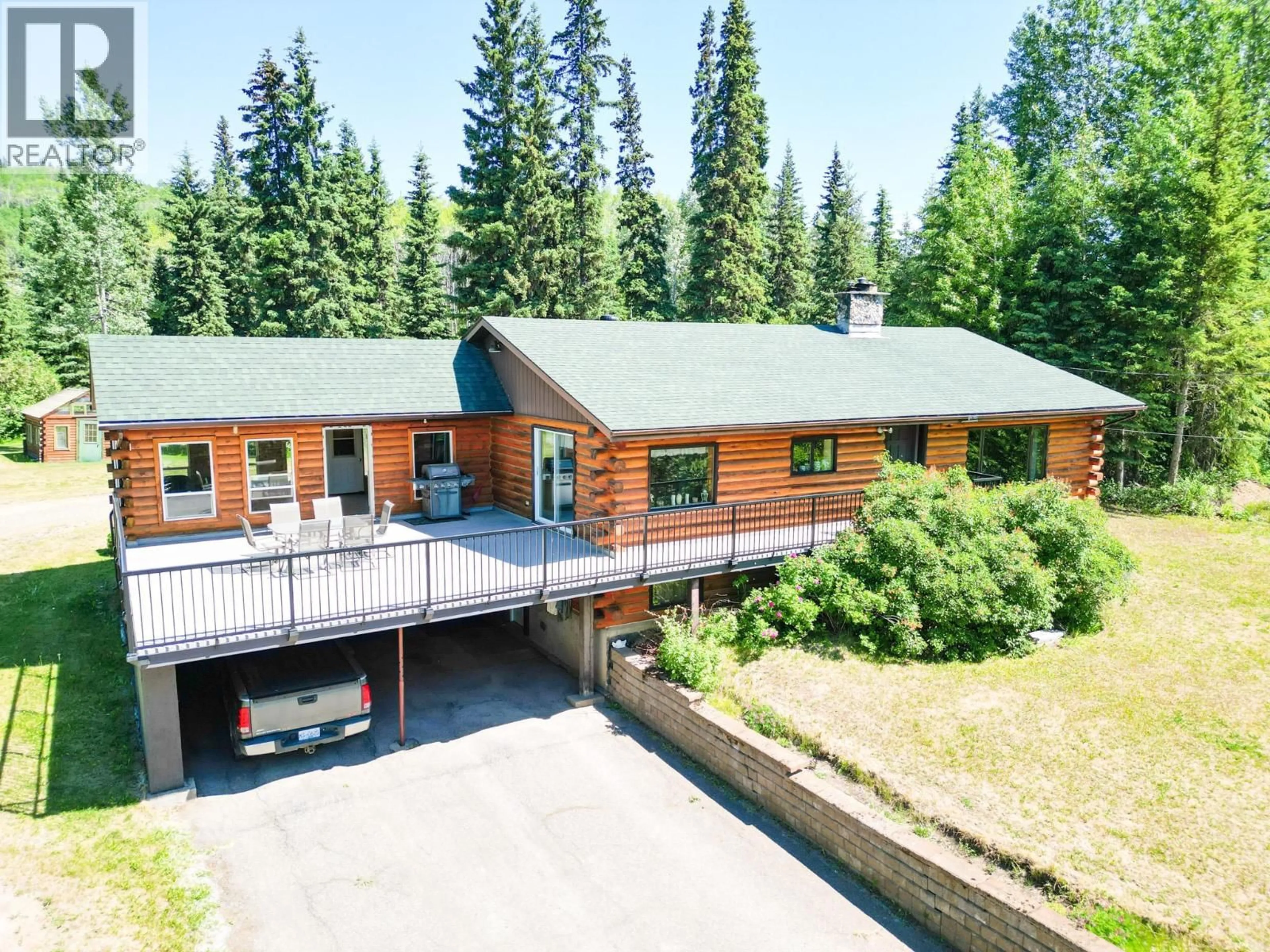 A pic from outside/outdoor area/front of a property/back of a property/a pic from drone, unknown for 4100 16 HIGHWAY, Burns Lake British Columbia V0J1E3