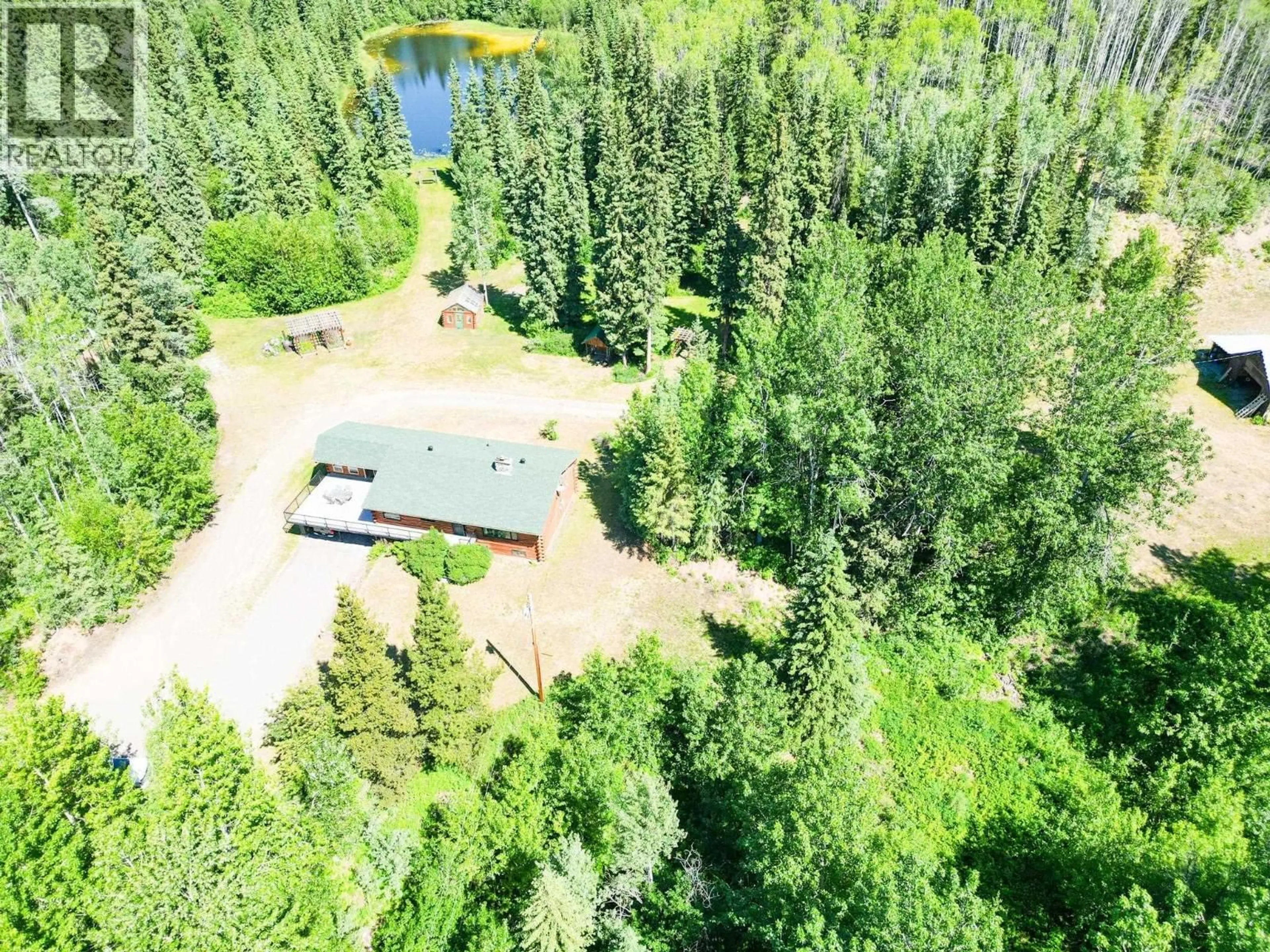 A pic from outside/outdoor area/front of a property/back of a property/a pic from drone, forest/trees view for 4100 16 HIGHWAY, Burns Lake British Columbia V0J1E3