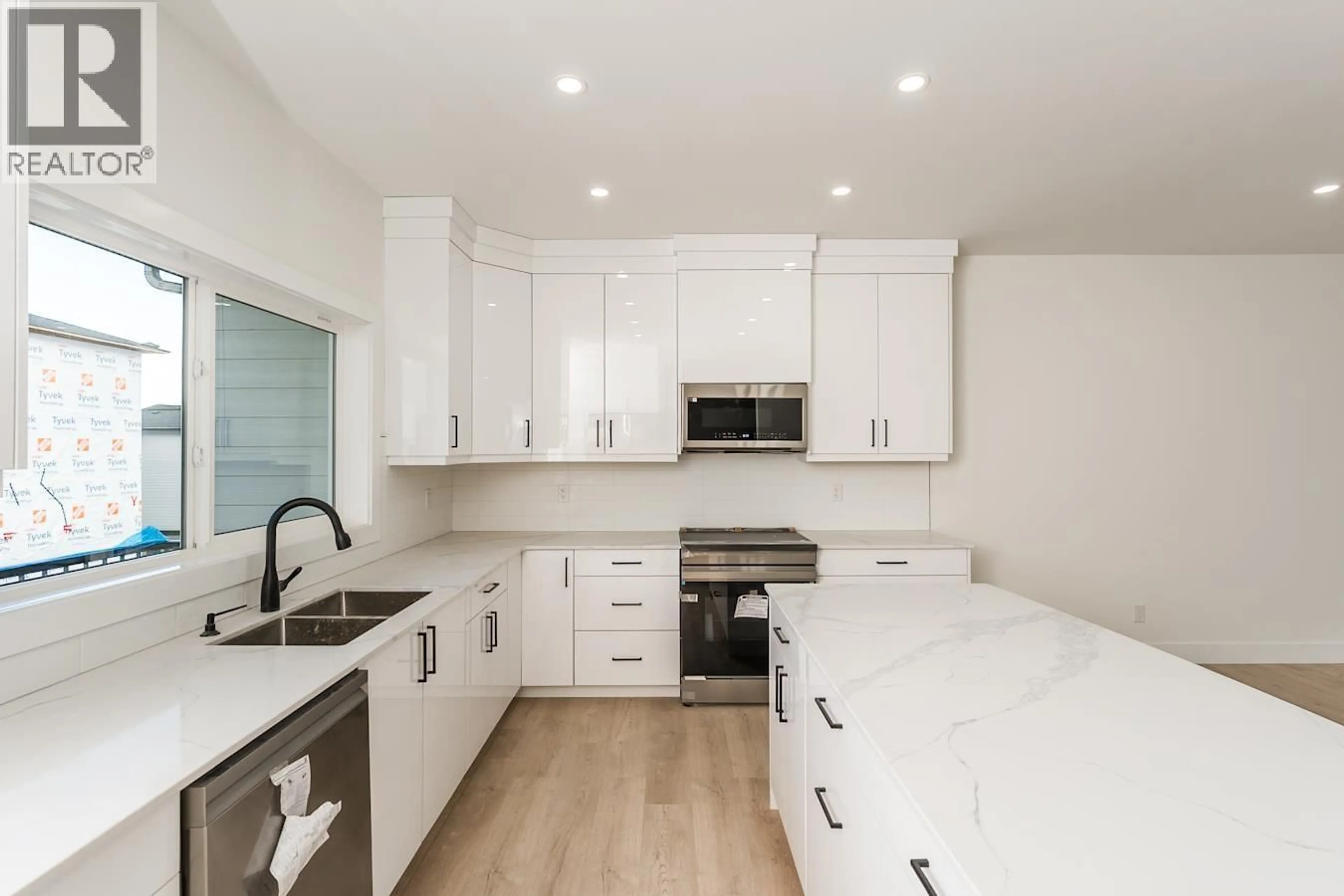 Open concept kitchen, unknown for 1502 - 2395 ROWE STREET, Prince George British Columbia V2N0C8