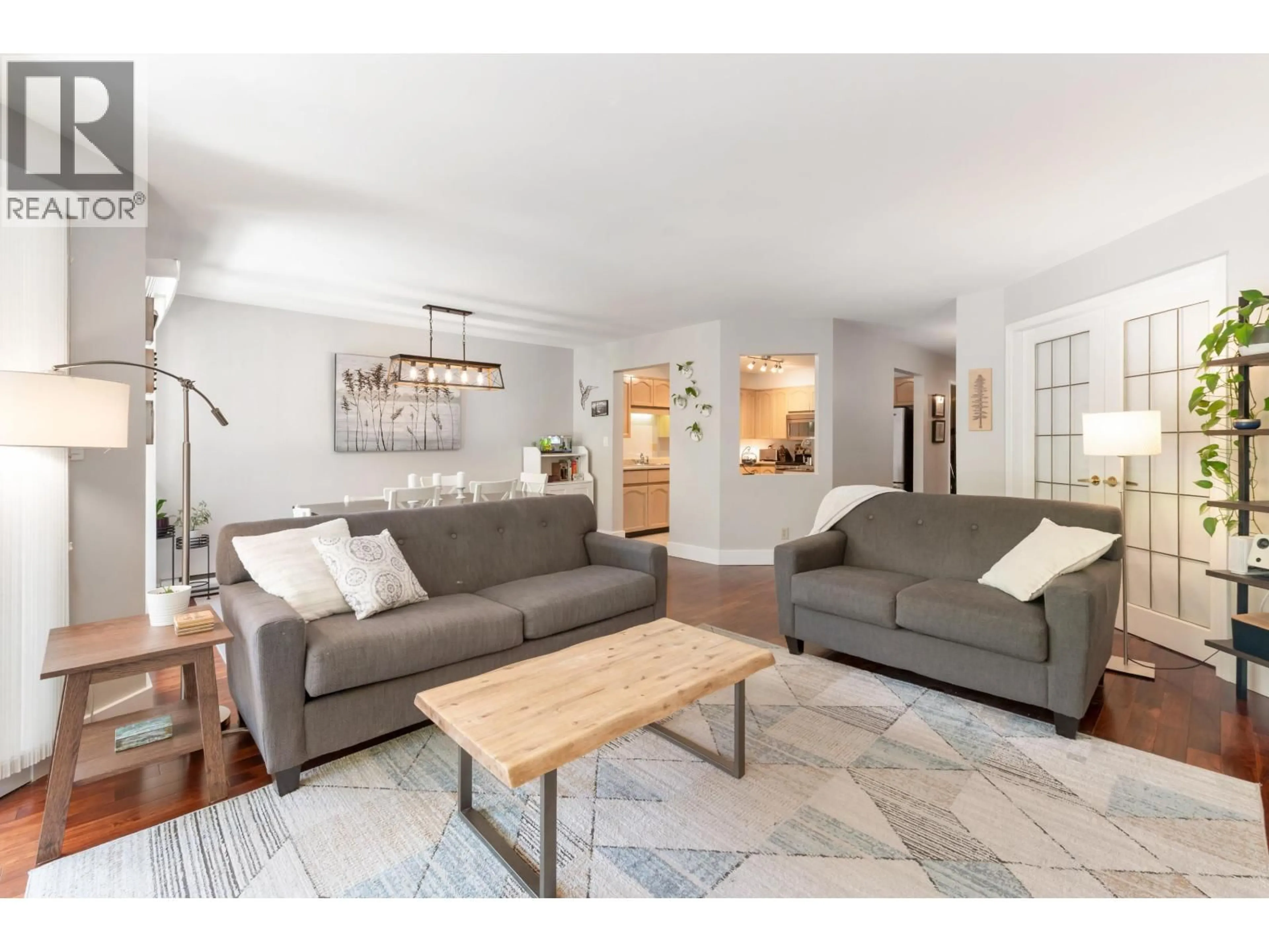 Living room with furniture, unknown for 201A - 1220 QUAYSIDE DRIVE, New Westminster British Columbia V3M6H1