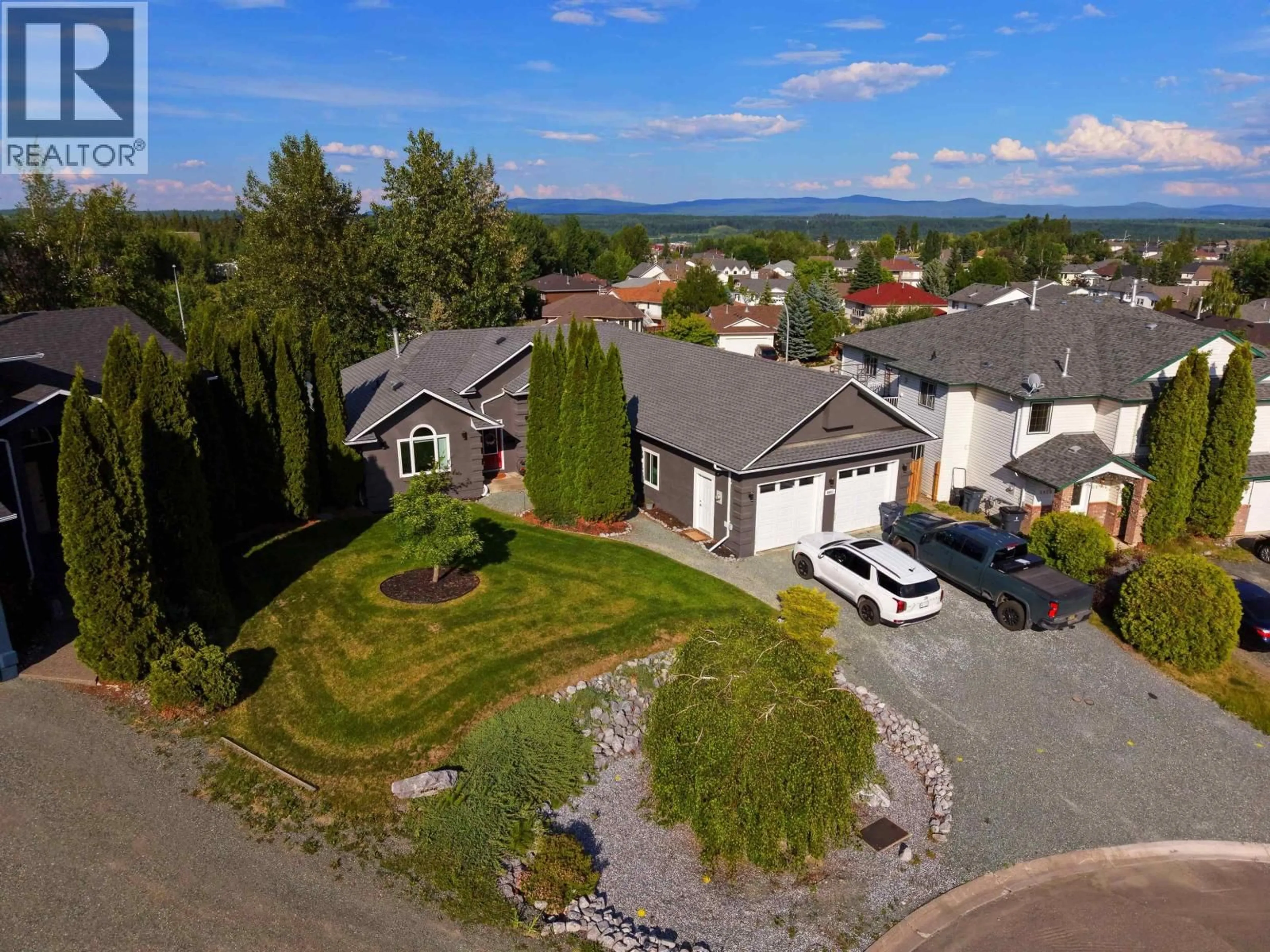 A pic from outside/outdoor area/front of a property/back of a property/a pic from drone, mountain view for 6908 ST FRANCES PLACE, Prince George British Columbia V2N5A4