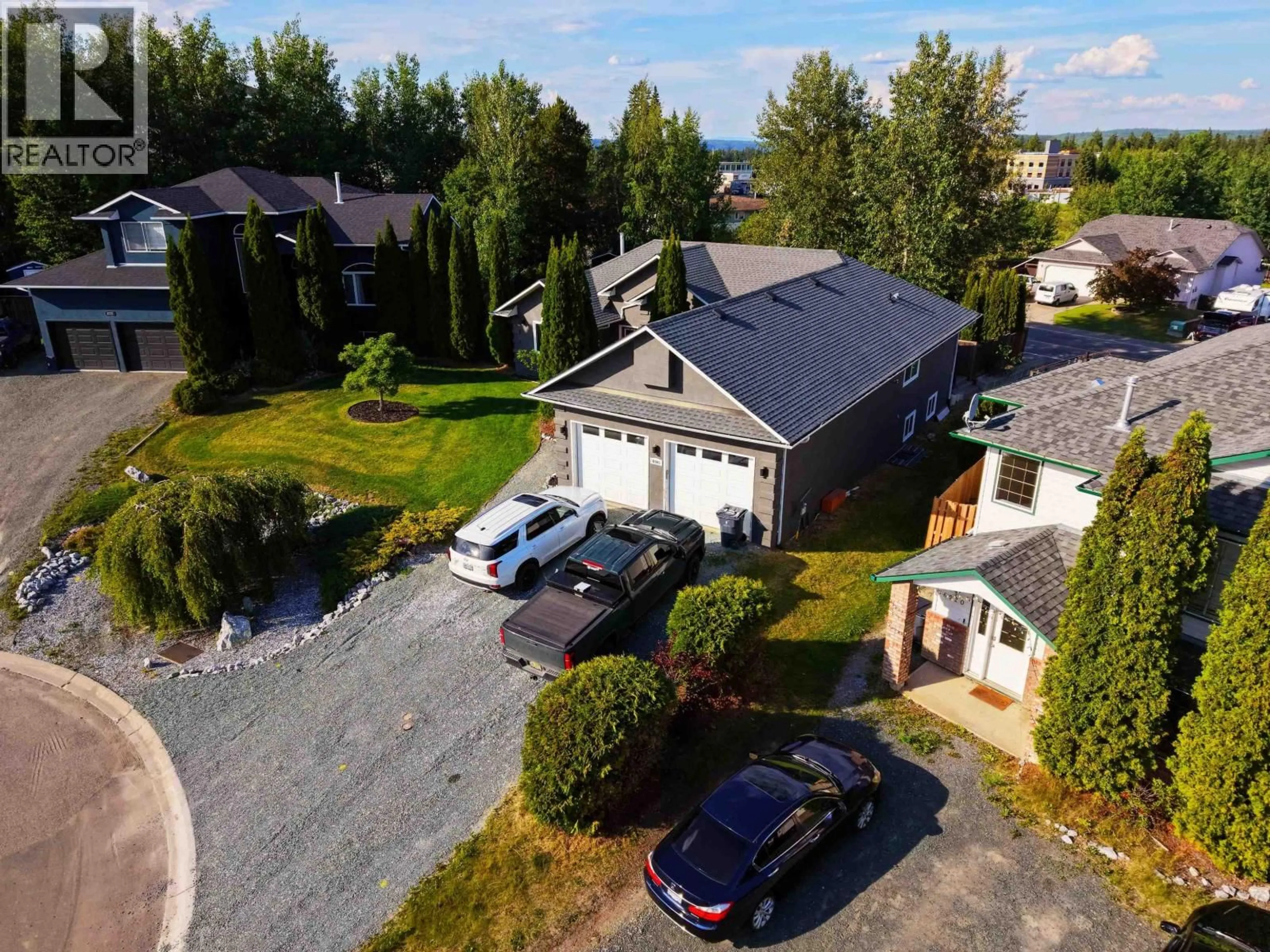 A pic from outside/outdoor area/front of a property/back of a property/a pic from drone, street for 6908 ST FRANCES PLACE, Prince George British Columbia V2N5A4