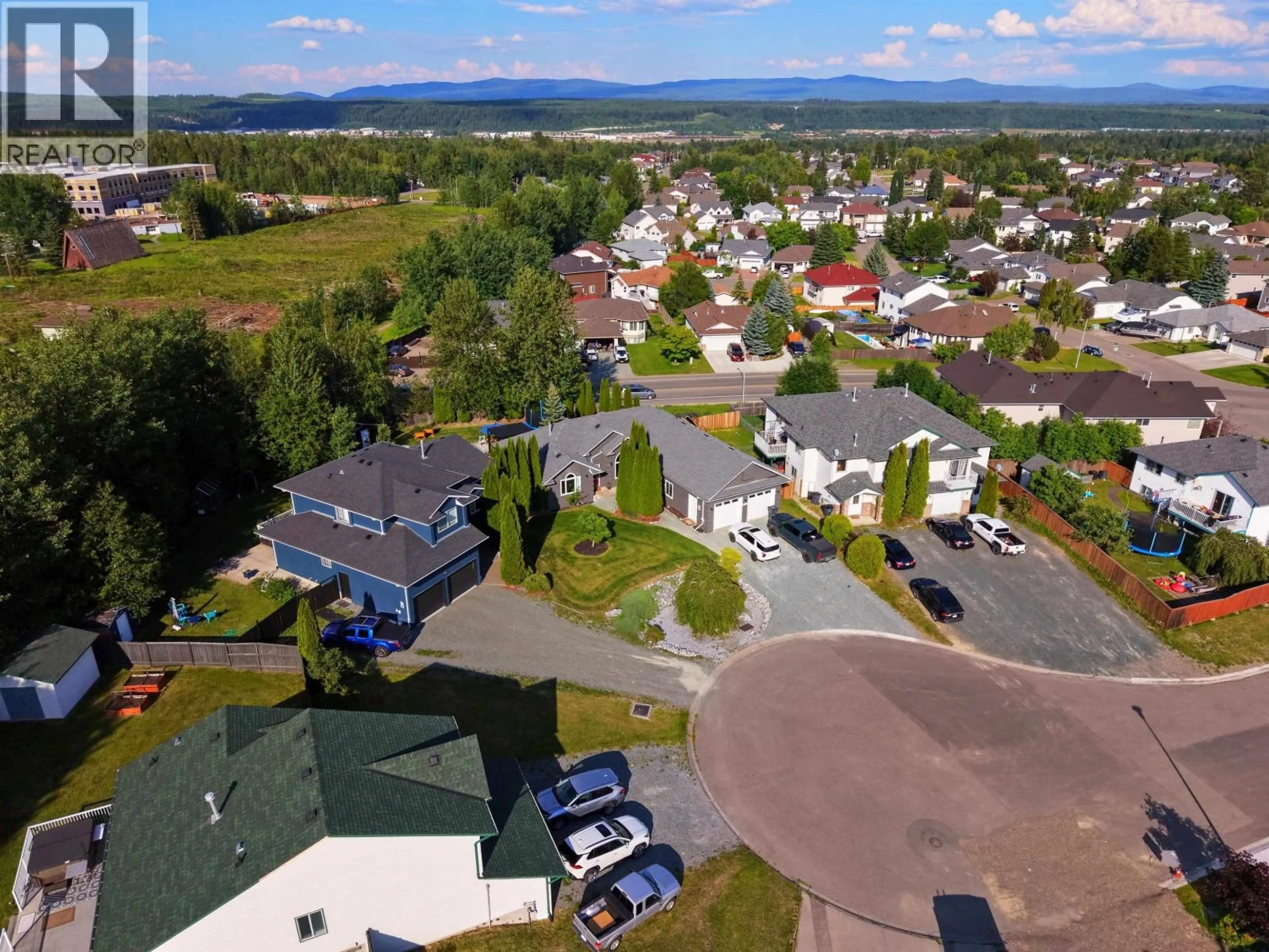 A pic from outside/outdoor area/front of a property/back of a property/a pic from drone, mountain view for 6908 ST FRANCES PLACE, Prince George British Columbia V2N5A4