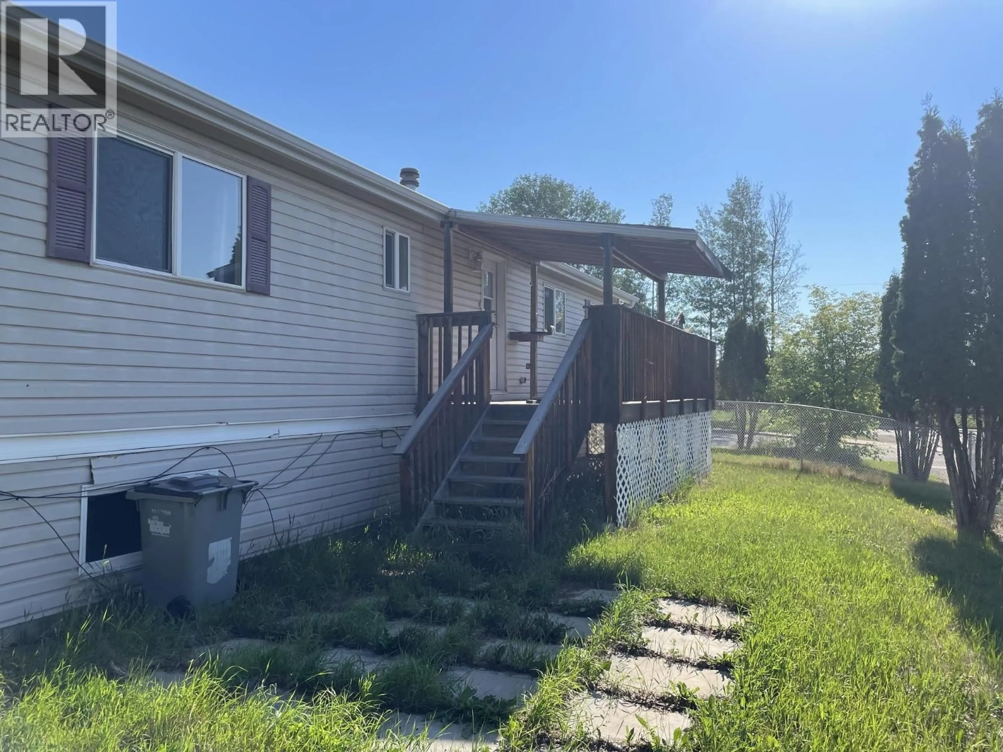 A pic from outside/outdoor area/front of a property/back of a property/a pic from drone, unknown for 5217 45 STREET, Fort Nelson British Columbia V0C1R0