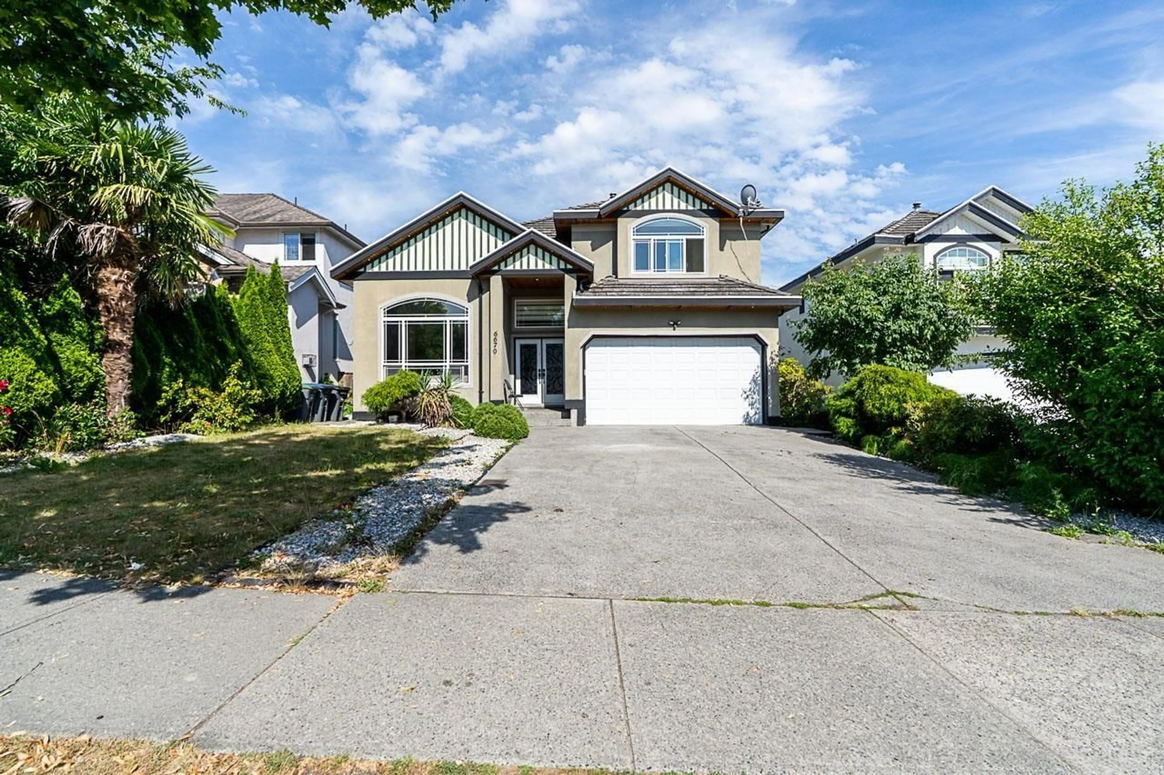 Home with vinyl exterior material, street for 6670 150 STREET, Surrey British Columbia V3S9G7
