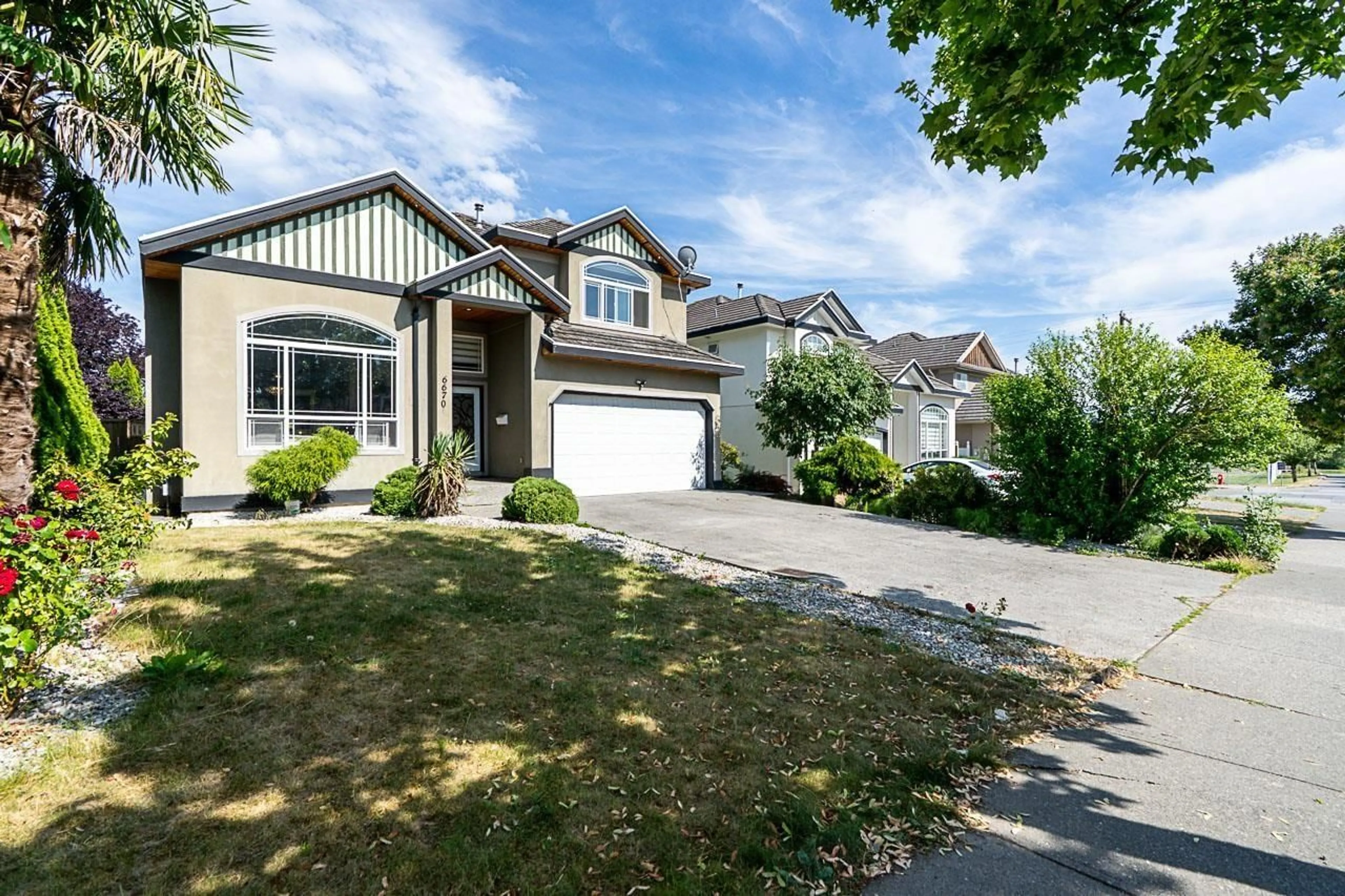 Home with vinyl exterior material, street for 6670 150 STREET, Surrey British Columbia V3S9G7