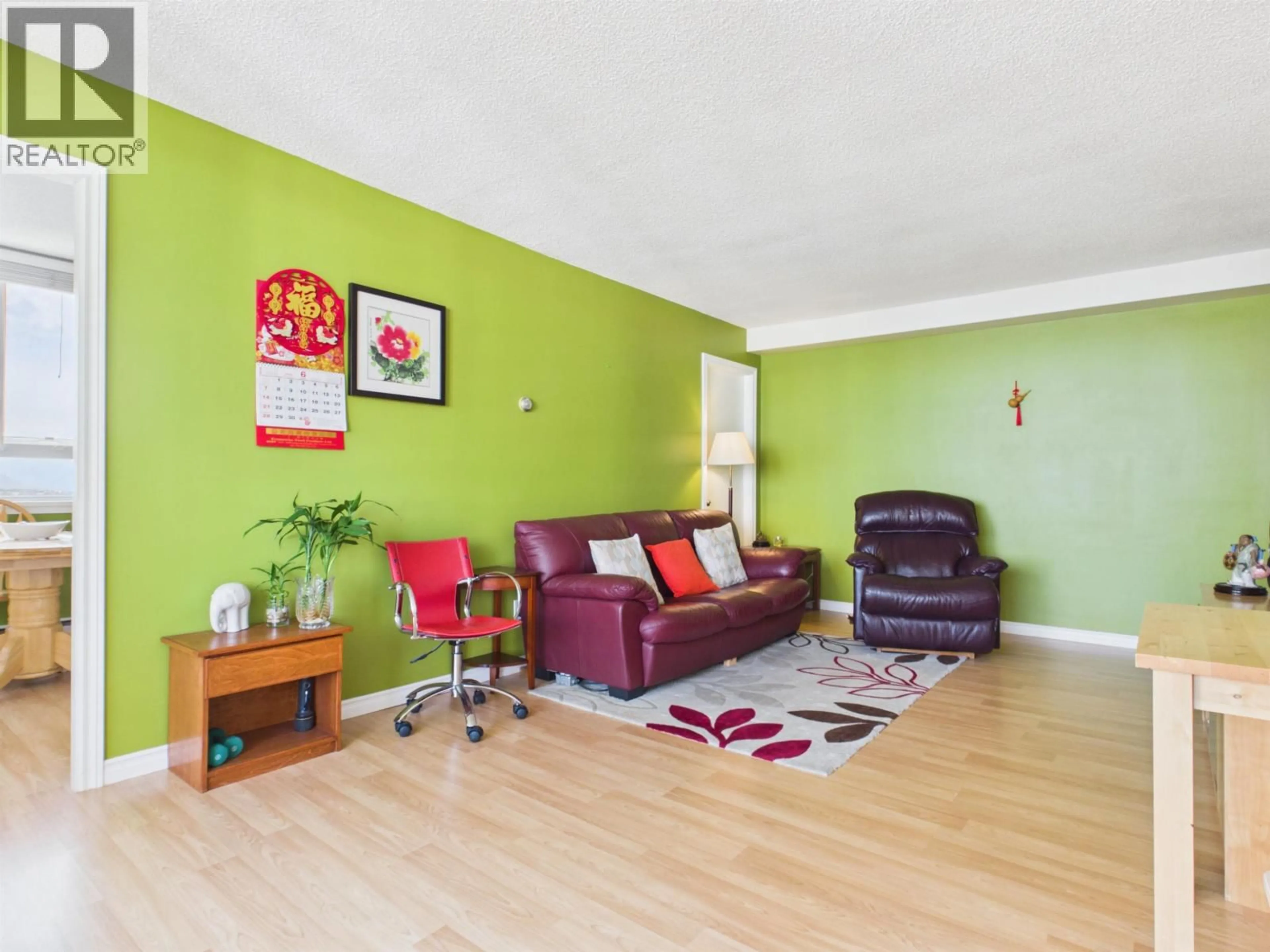 Living room with furniture, wood/laminate floor for 1702 - 5645 BARKER AVENUE, Burnaby British Columbia V5H3Z5