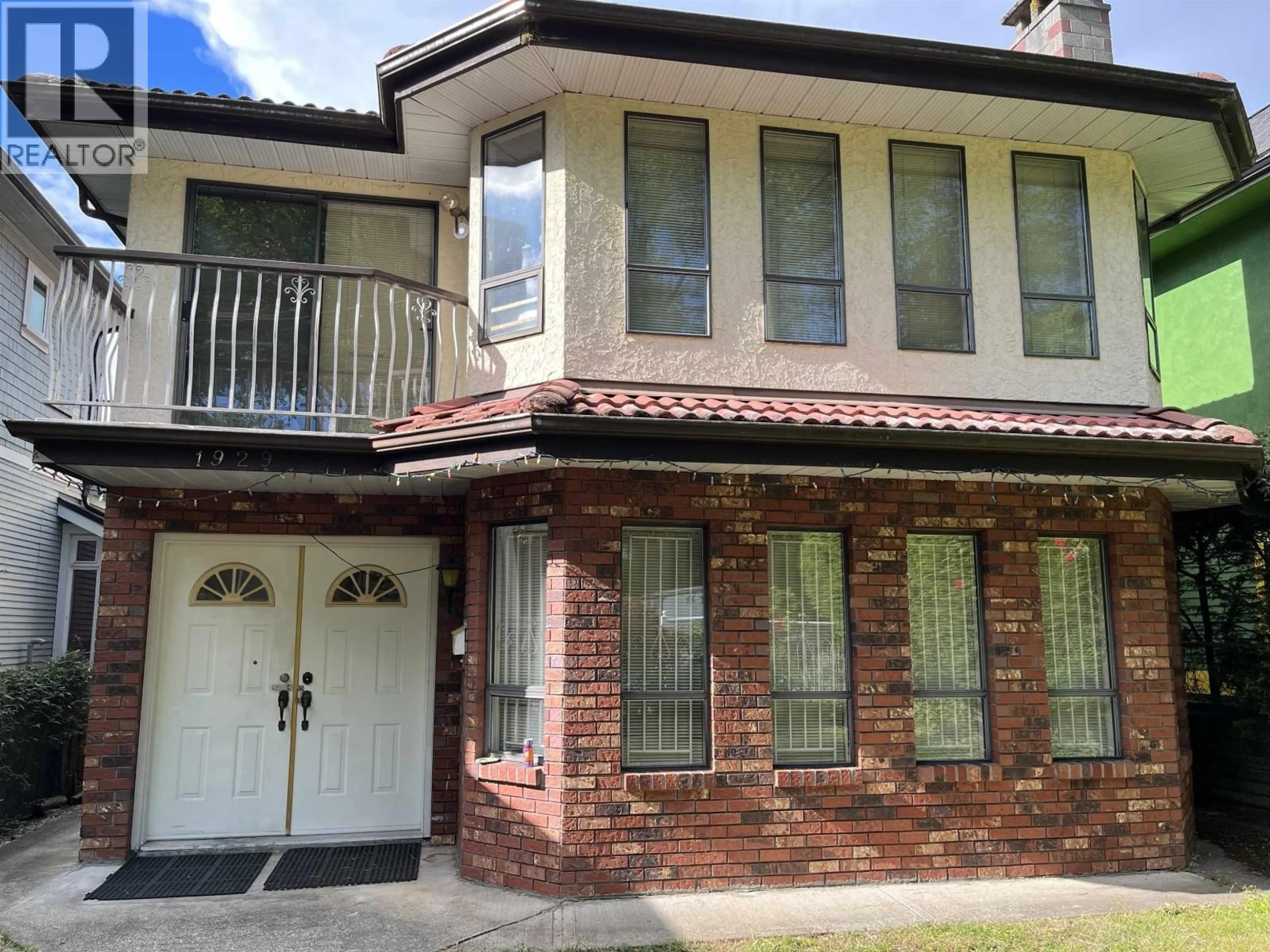 Home with brick exterior material, street for 1929 6TH AVENUE, Vancouver British Columbia V5N1P6