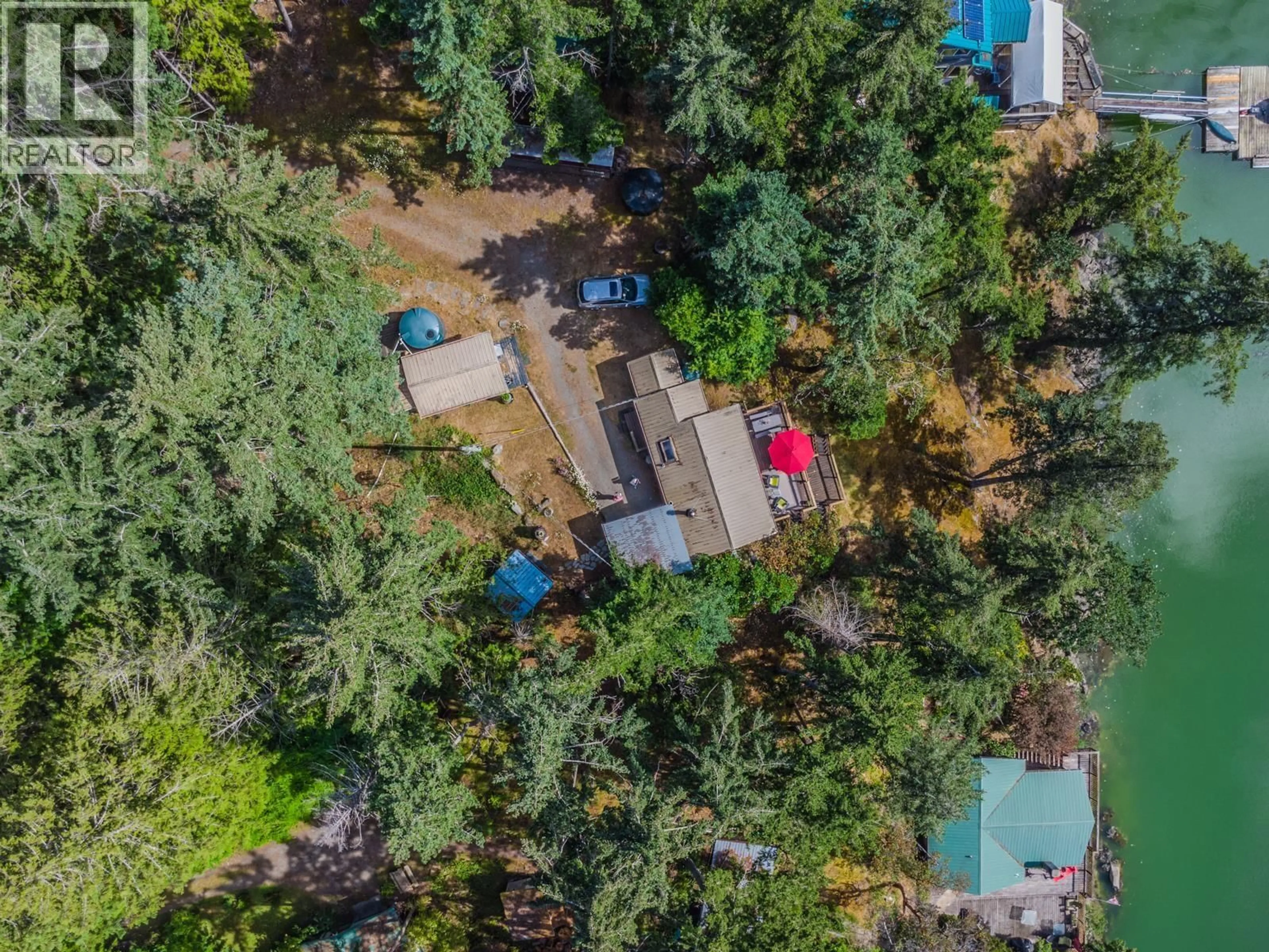 A pic from outside/outdoor area/front of a property/back of a property/a pic from drone, forest/trees view for 75 WHALER BAY ROAD, Galiano Island British Columbia V0N1P0