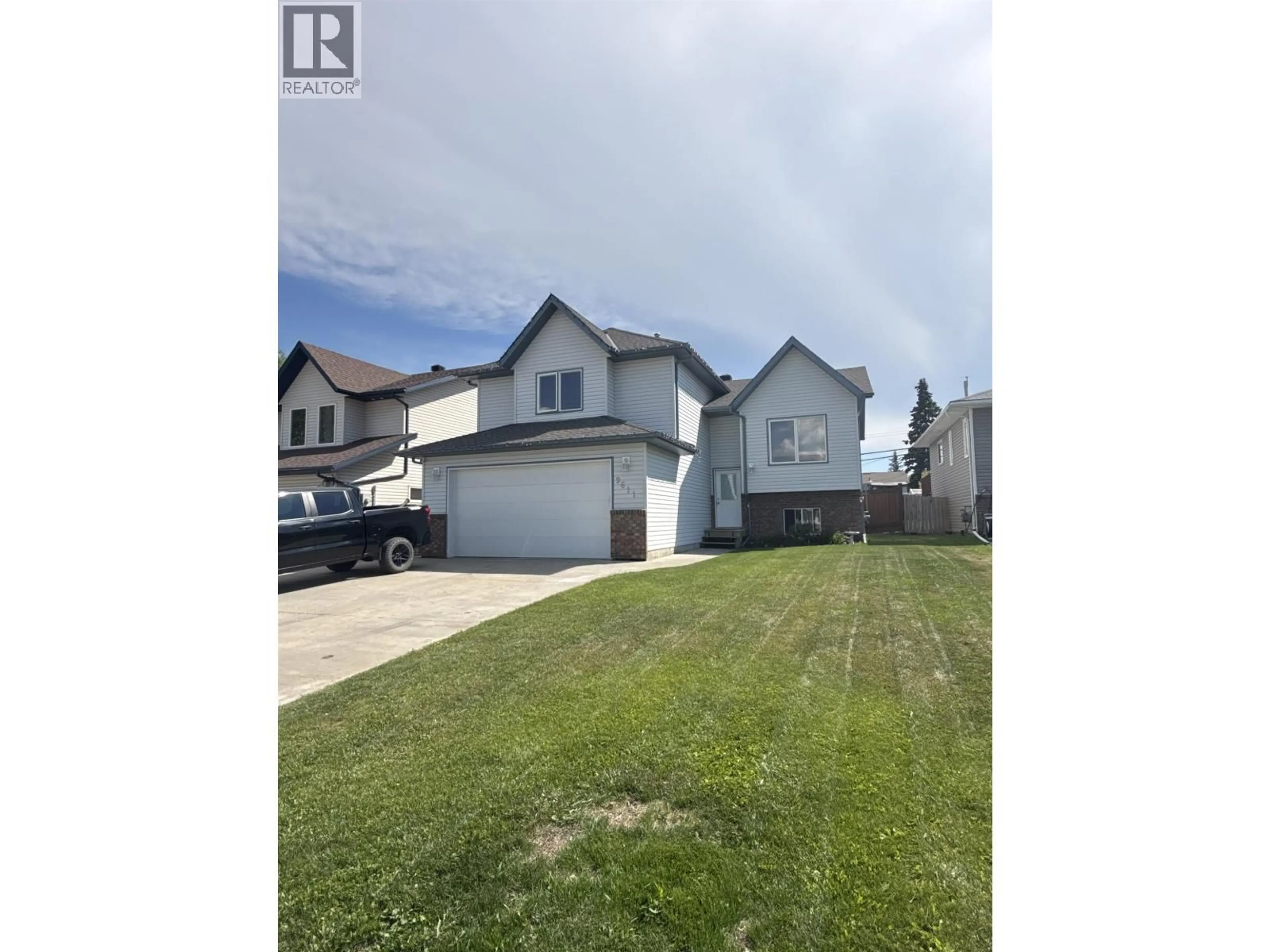 A pic from outside/outdoor area/front of a property/back of a property/a pic from drone, street for 9611 113 AVENUE, Fort St. John British Columbia V1J7J1