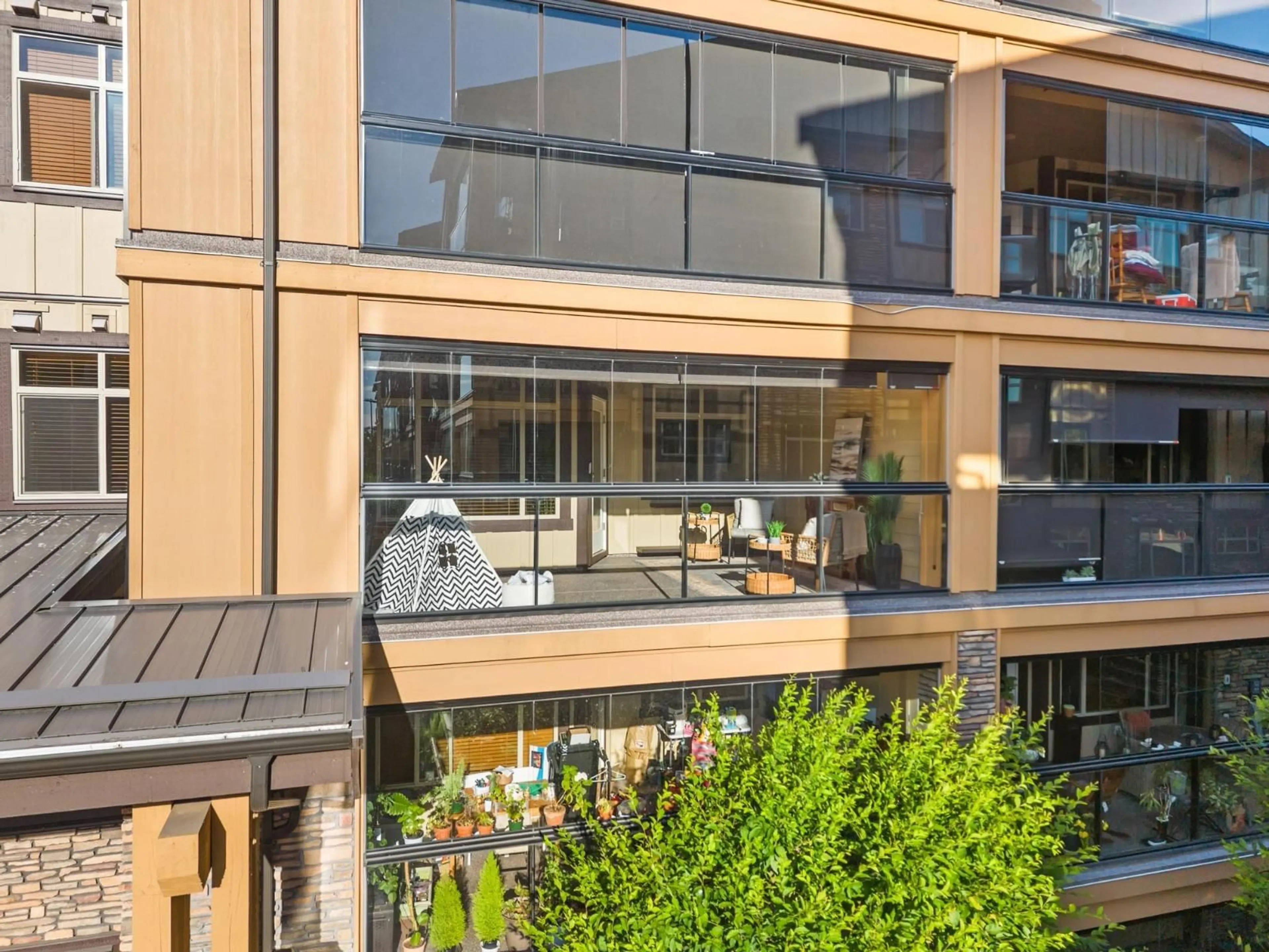 Patio, city buildings view from balcony for A310 - 8218 207A STREET, Langley British Columbia V2Y0X9
