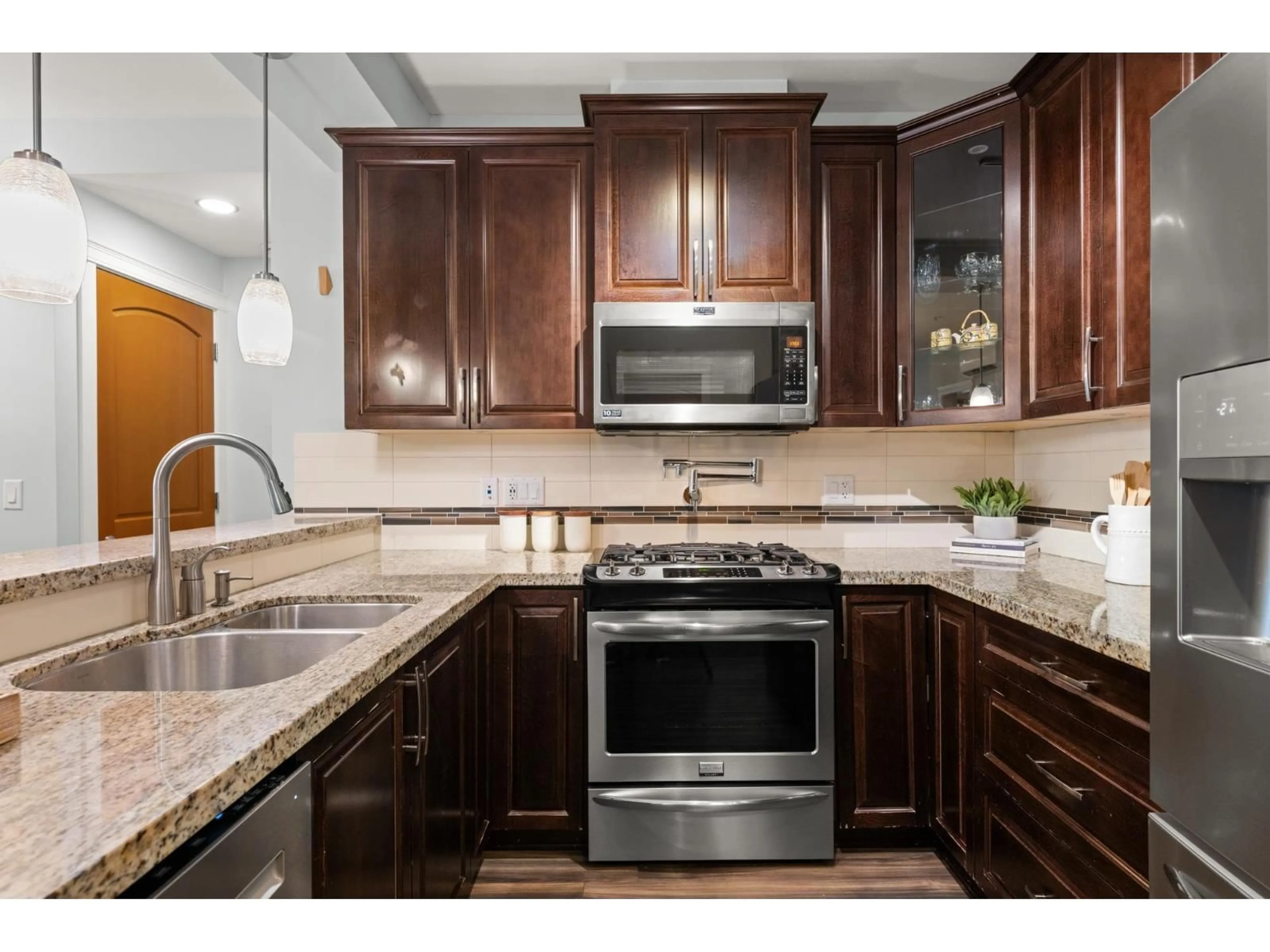 Open concept kitchen, ceramic/tile floor for A310 - 8218 207A STREET, Langley British Columbia V2Y0X9