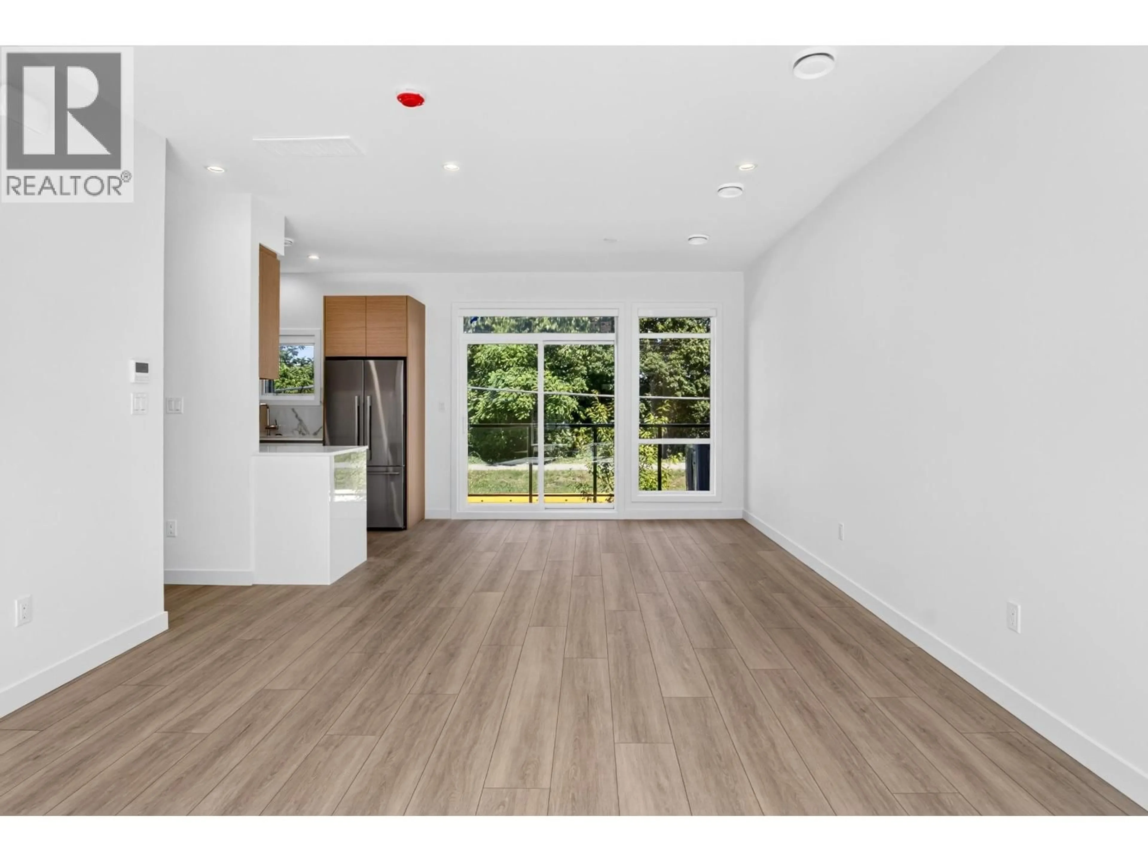 Open concept kitchen, wood/laminate floor for 46 - 4337 BOUNDARY ROAD, Richmond British Columbia V6V1S8