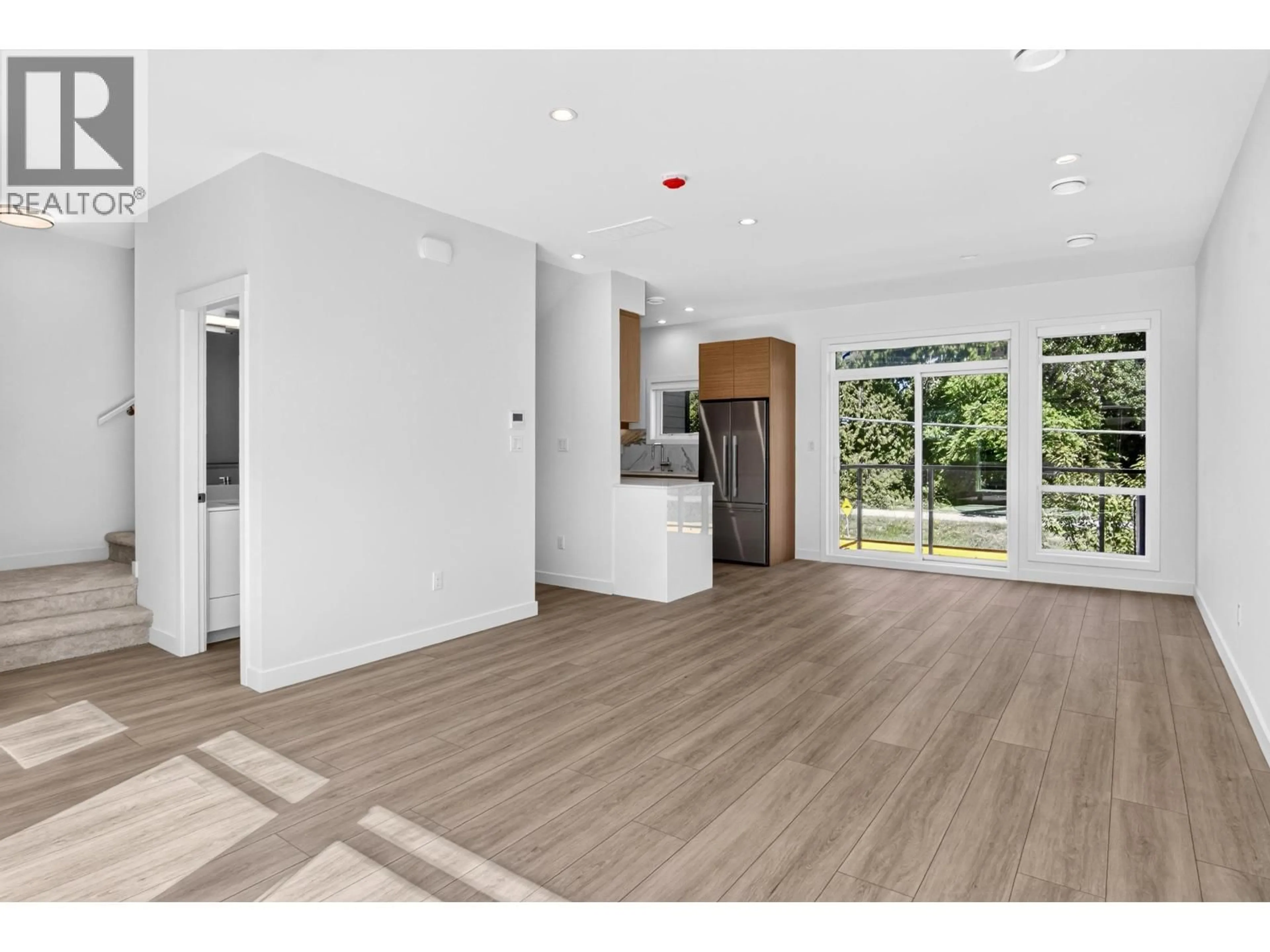 Open concept kitchen, wood/laminate floor for 46 - 4337 BOUNDARY ROAD, Richmond British Columbia V6V1S8