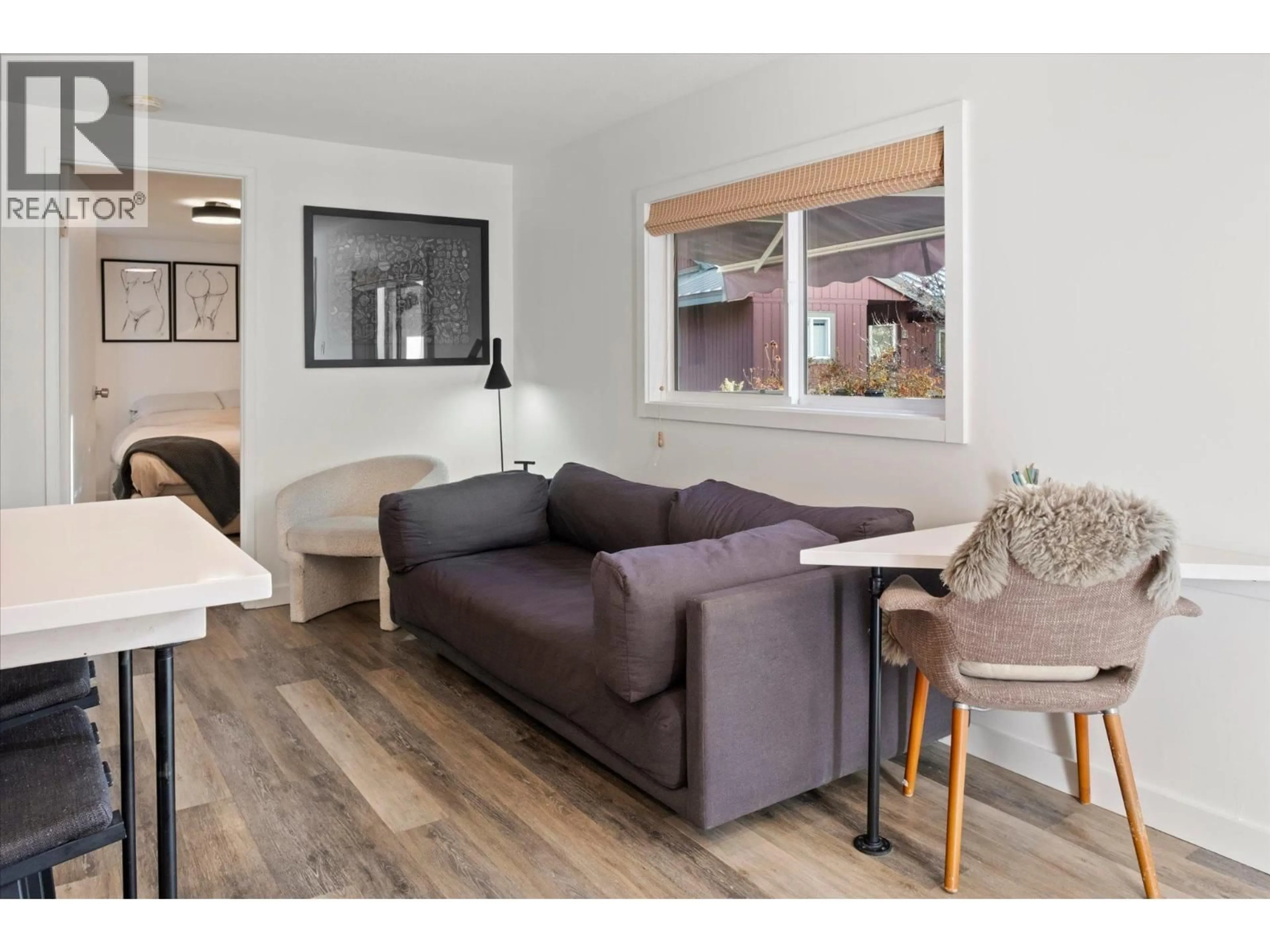 Living room with furniture, wood/laminate floor for 26 - 6800 CRABAPPLE DRIVE, Whistler British Columbia V8E0C5
