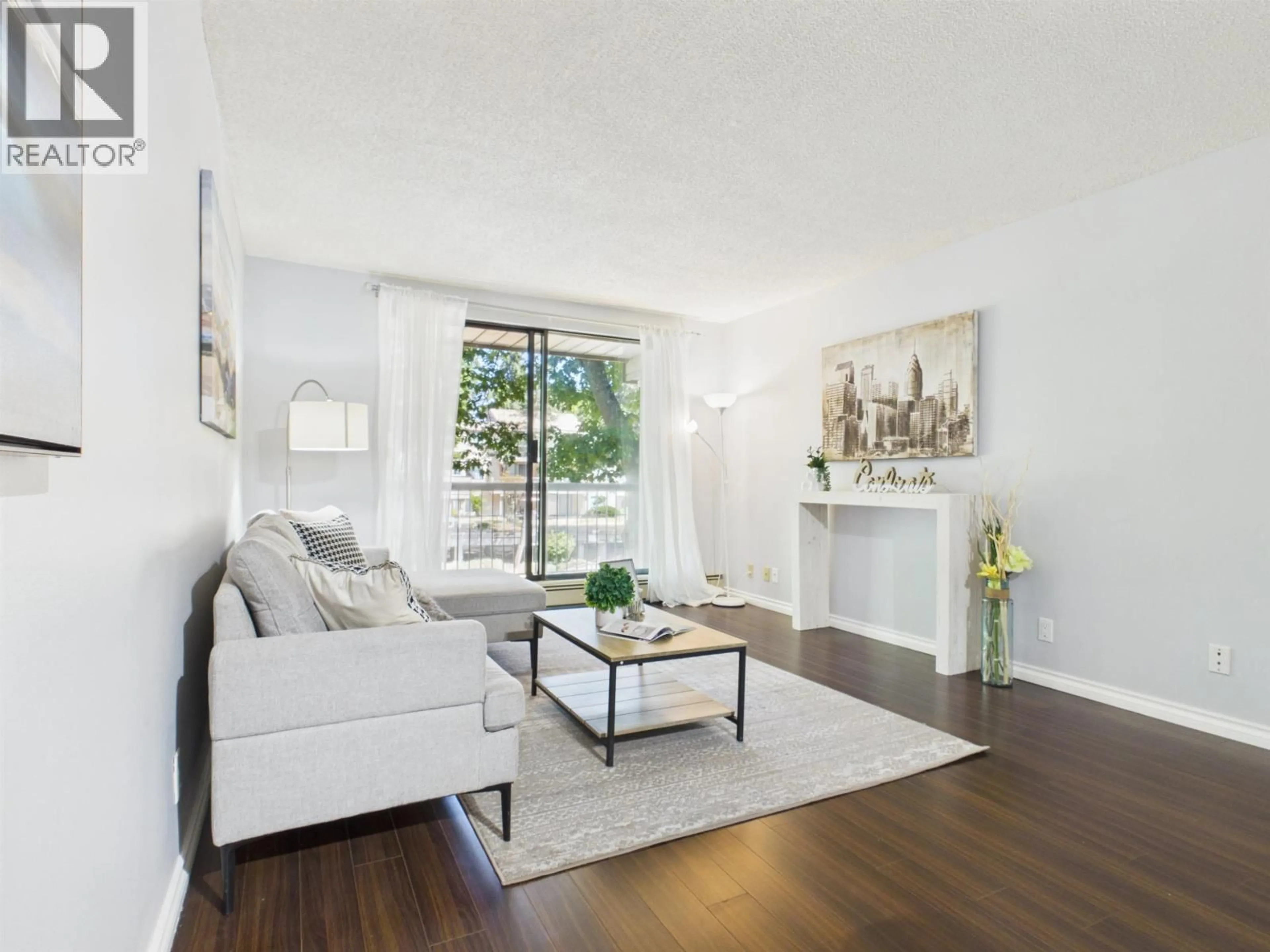 Living room with furniture, wood/laminate floor for 220 - 8411 ACKROYD, Richmond British Columbia V6X3E6