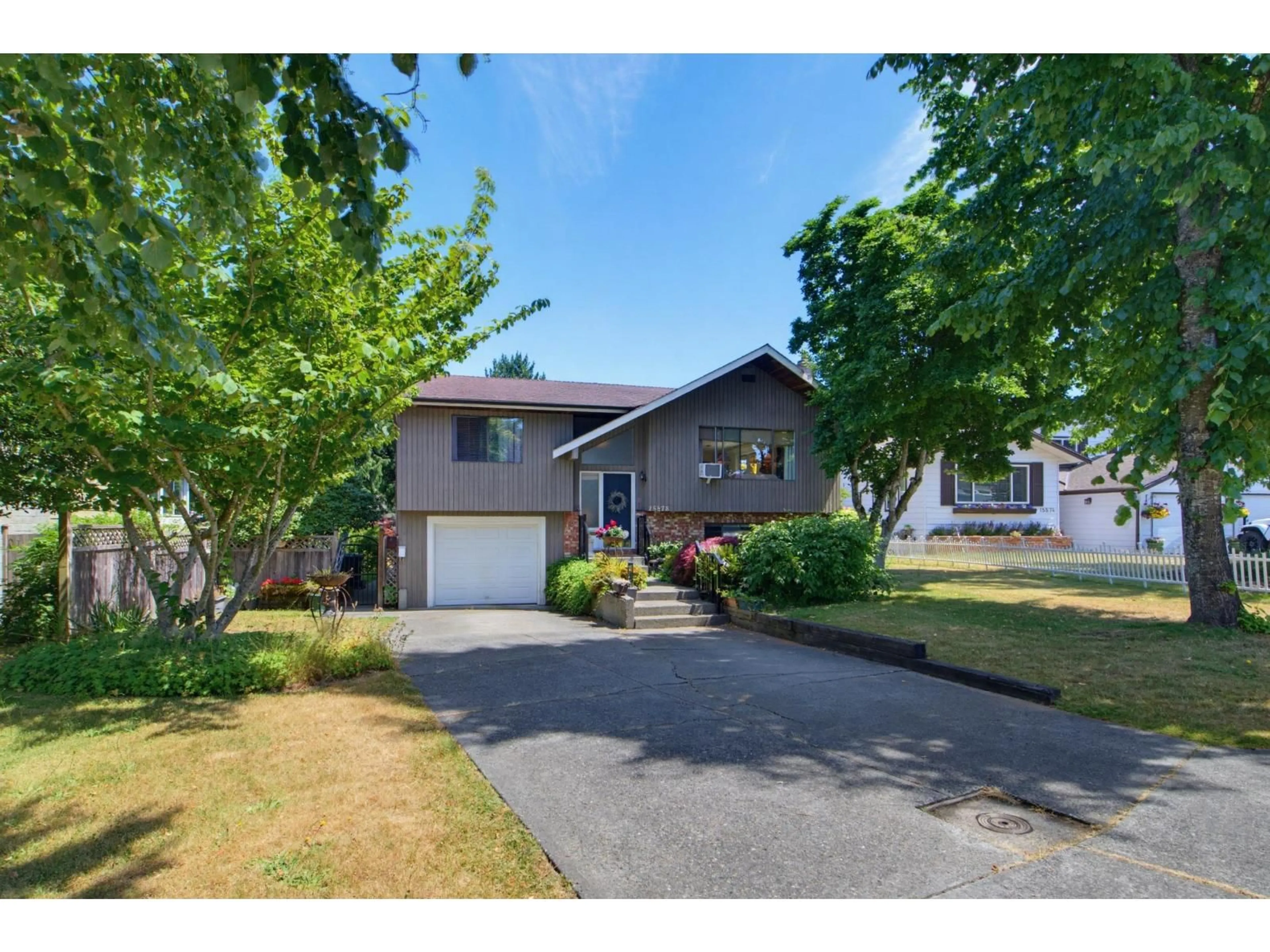 Home with vinyl exterior material, street for 15578 POPLAR DRIVE, Surrey British Columbia V4A5H8