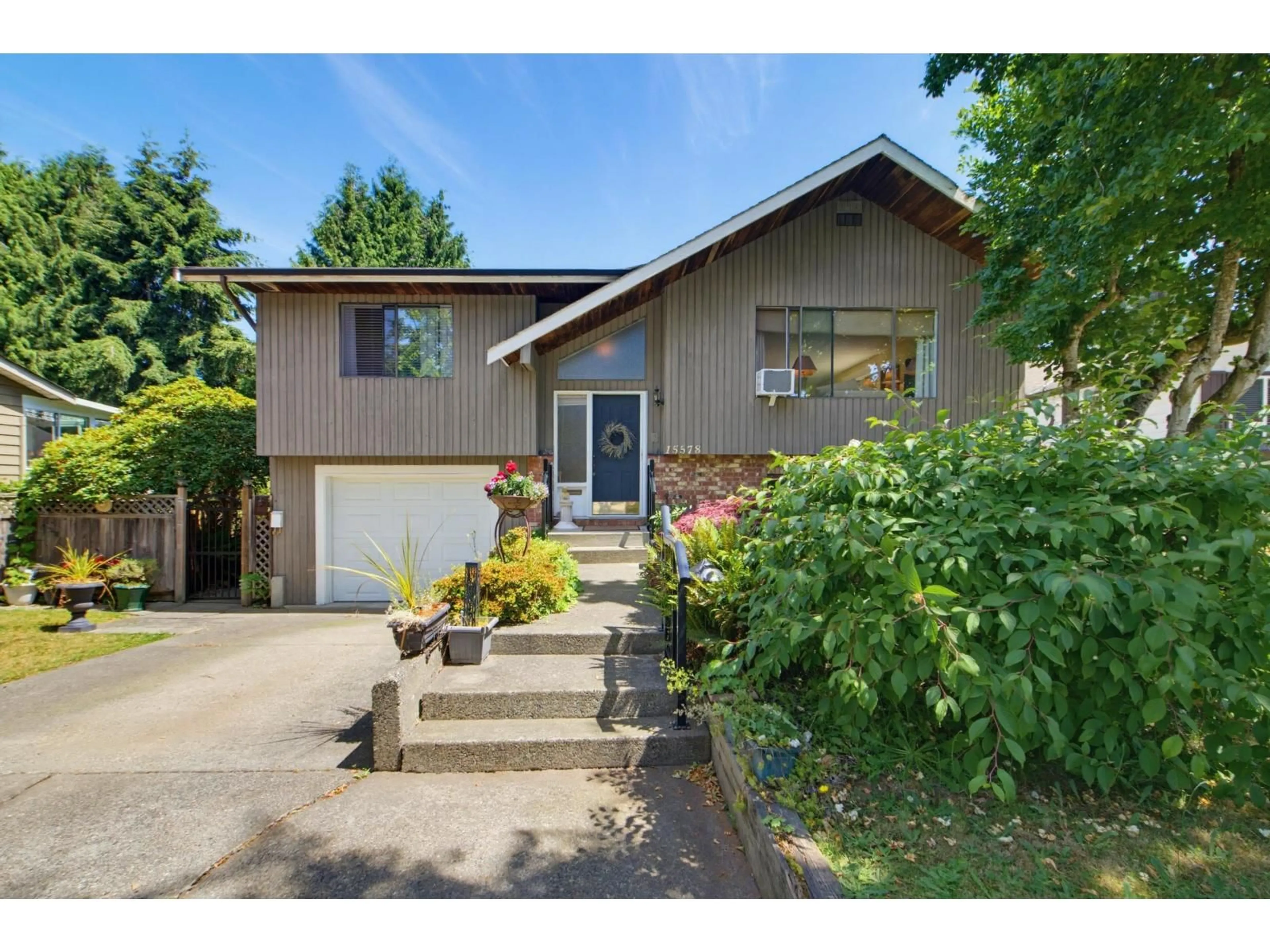Home with vinyl exterior material, street for 15578 POPLAR DRIVE, Surrey British Columbia V4A5H8