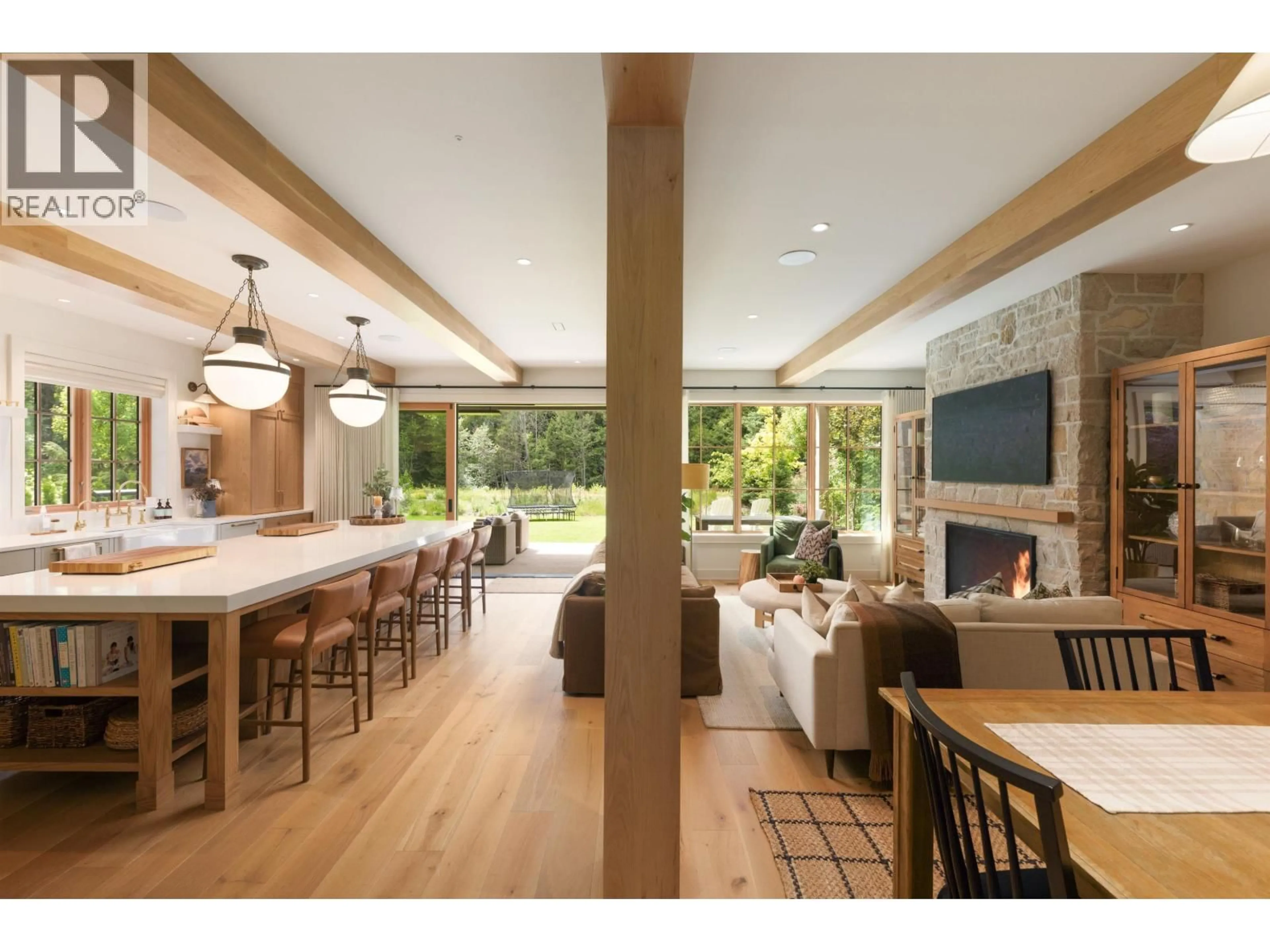 Open concept kitchen, wood/laminate floor for 7249 FITZSIMMONS ROAD, Whistler British Columbia V8E0E6