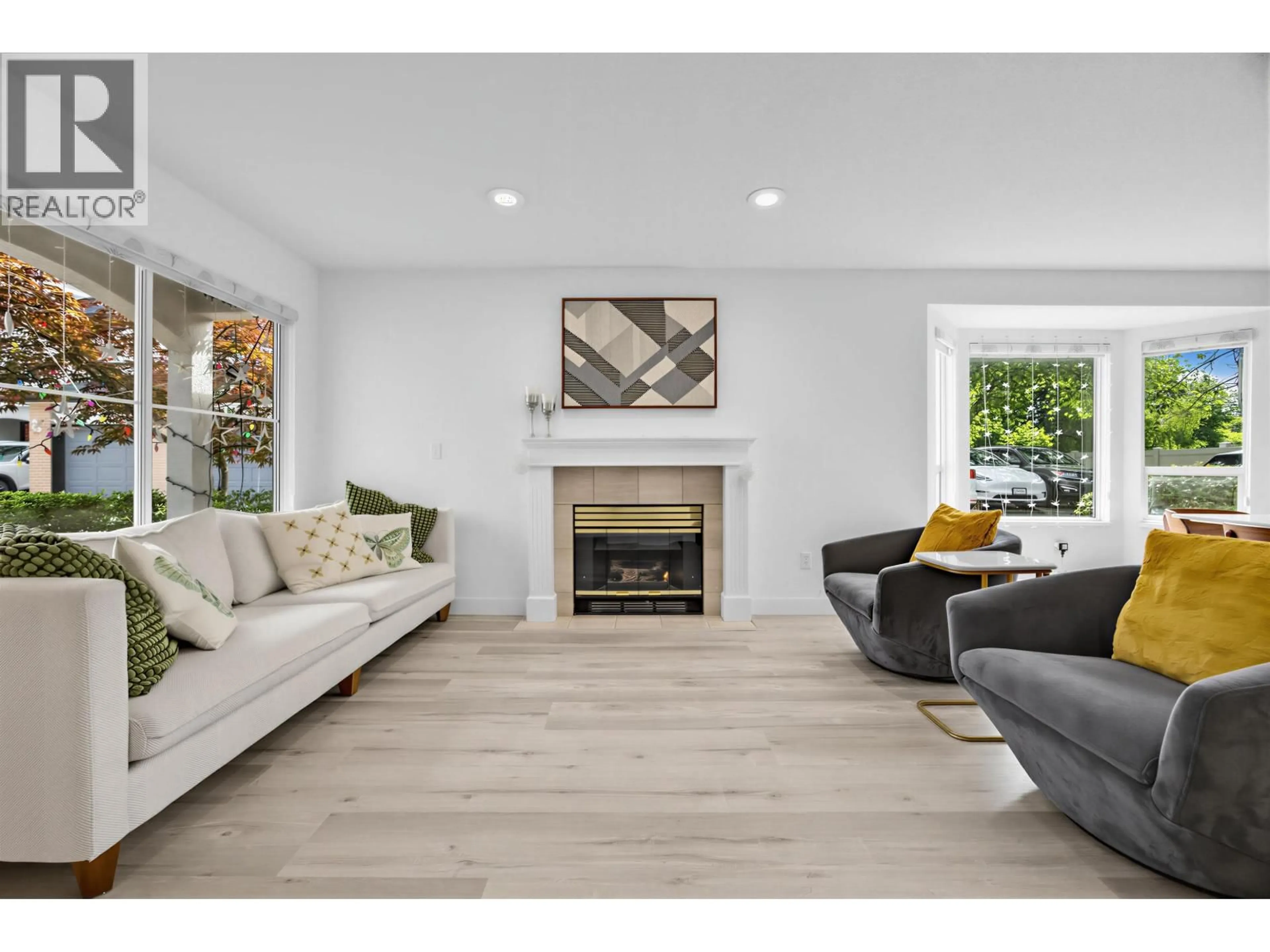 Living room with furniture, wood/laminate floor for 54 - 8120 GENERAL CURRIE ROAD, Richmond British Columbia V6Y3V8