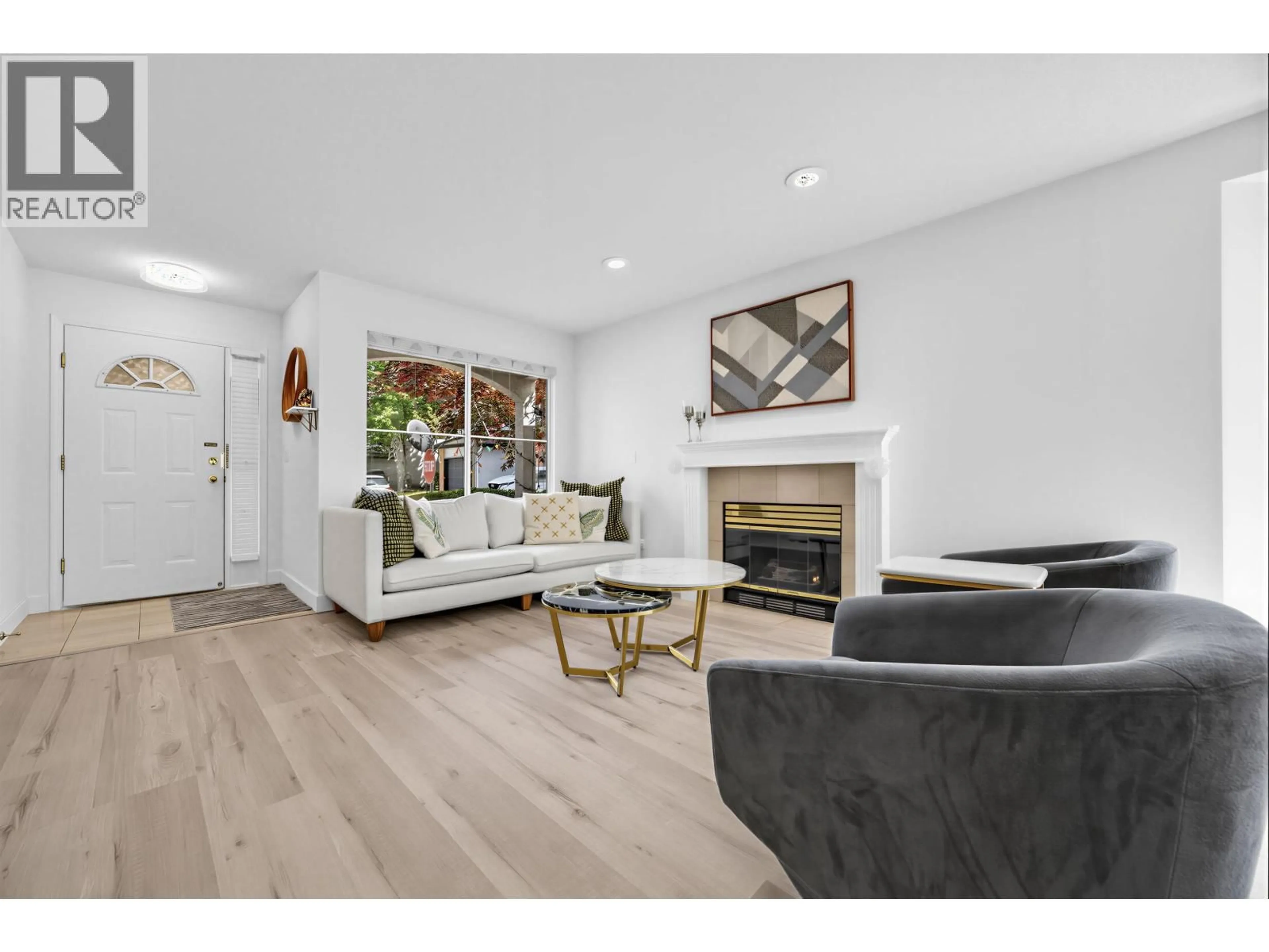 Living room with furniture, wood/laminate floor for 54 - 8120 GENERAL CURRIE ROAD, Richmond British Columbia V6Y3V8