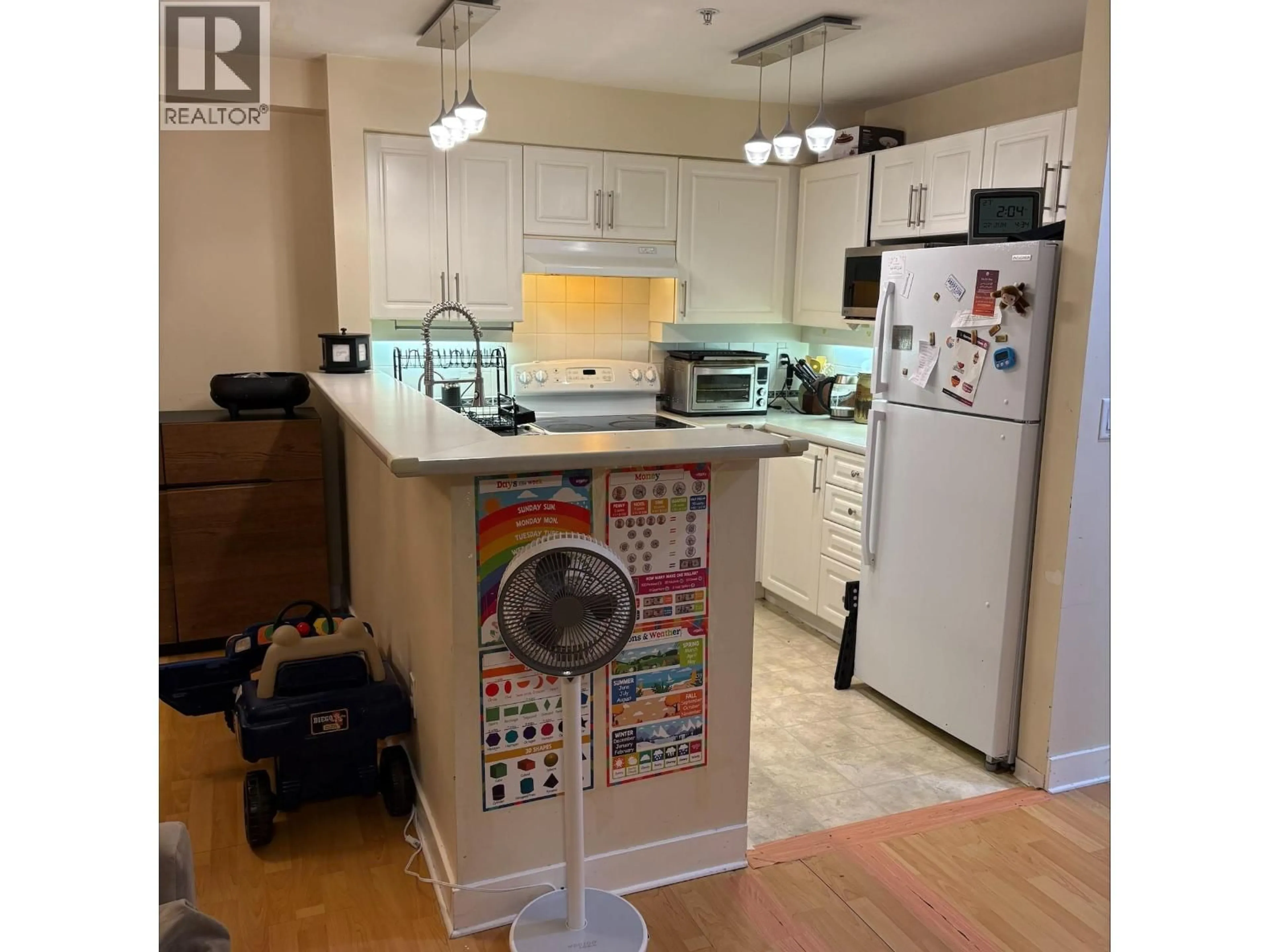 Kitchen with laundary machines, unknown for 102 - 7038 21ST AVENUE, Burnaby British Columbia V5E2Y9