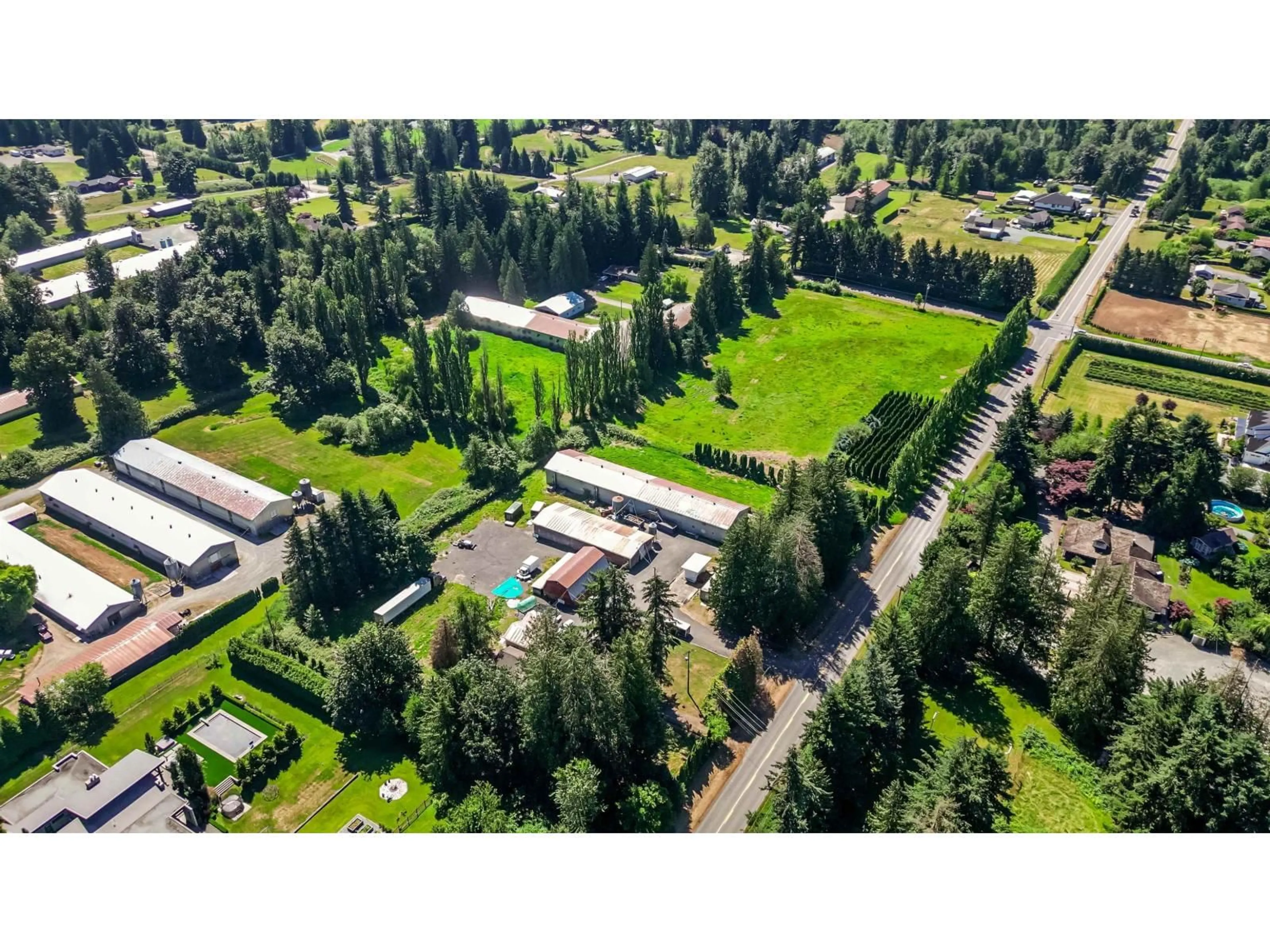 A pic from outside/outdoor area/front of a property/back of a property/a pic from drone, mountain view for 5950 BRADNER ROAD, Abbotsford British Columbia V4X2C7
