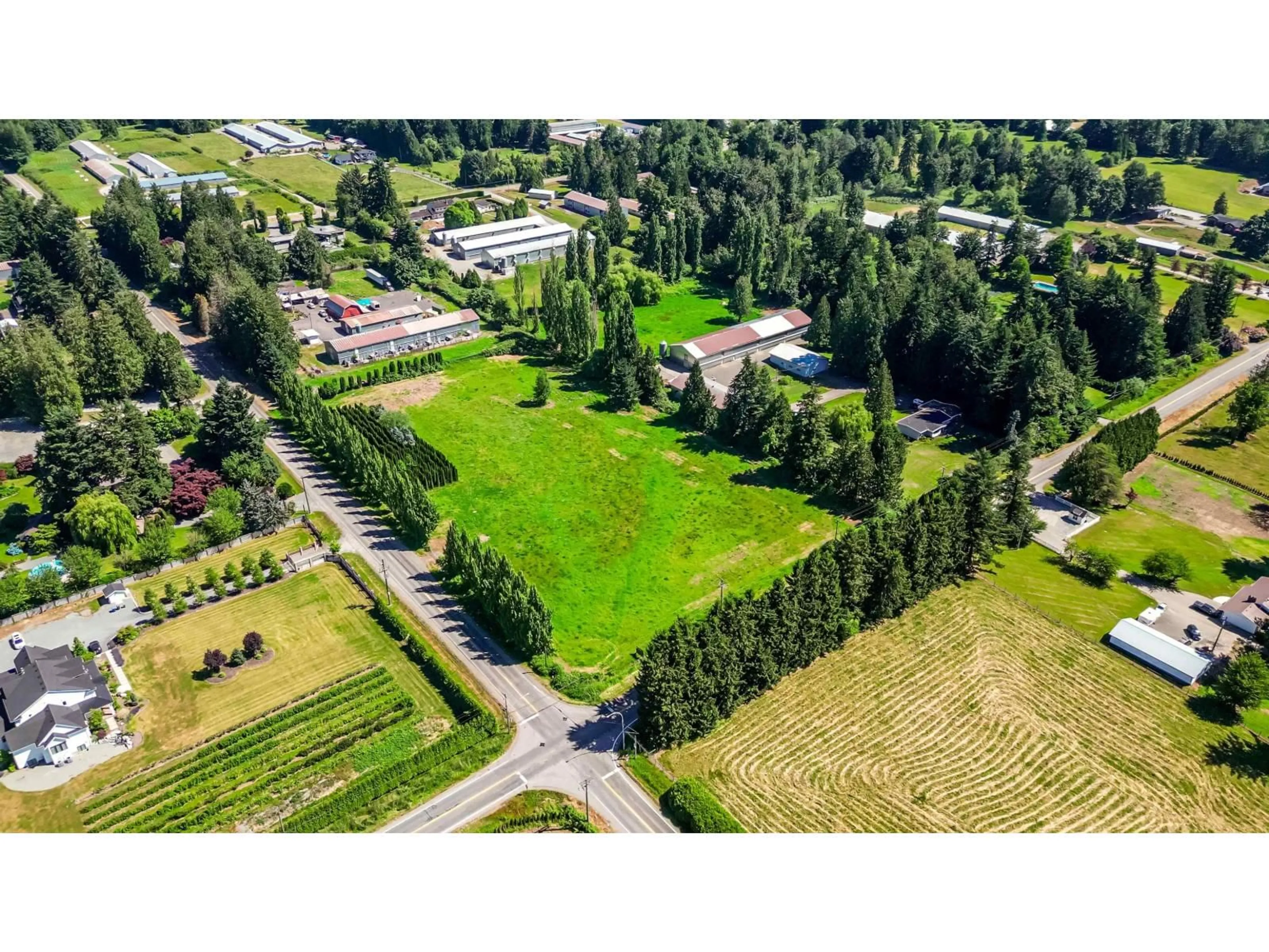 A pic from outside/outdoor area/front of a property/back of a property/a pic from drone, unknown for 5950 BRADNER ROAD, Abbotsford British Columbia V4X2C7