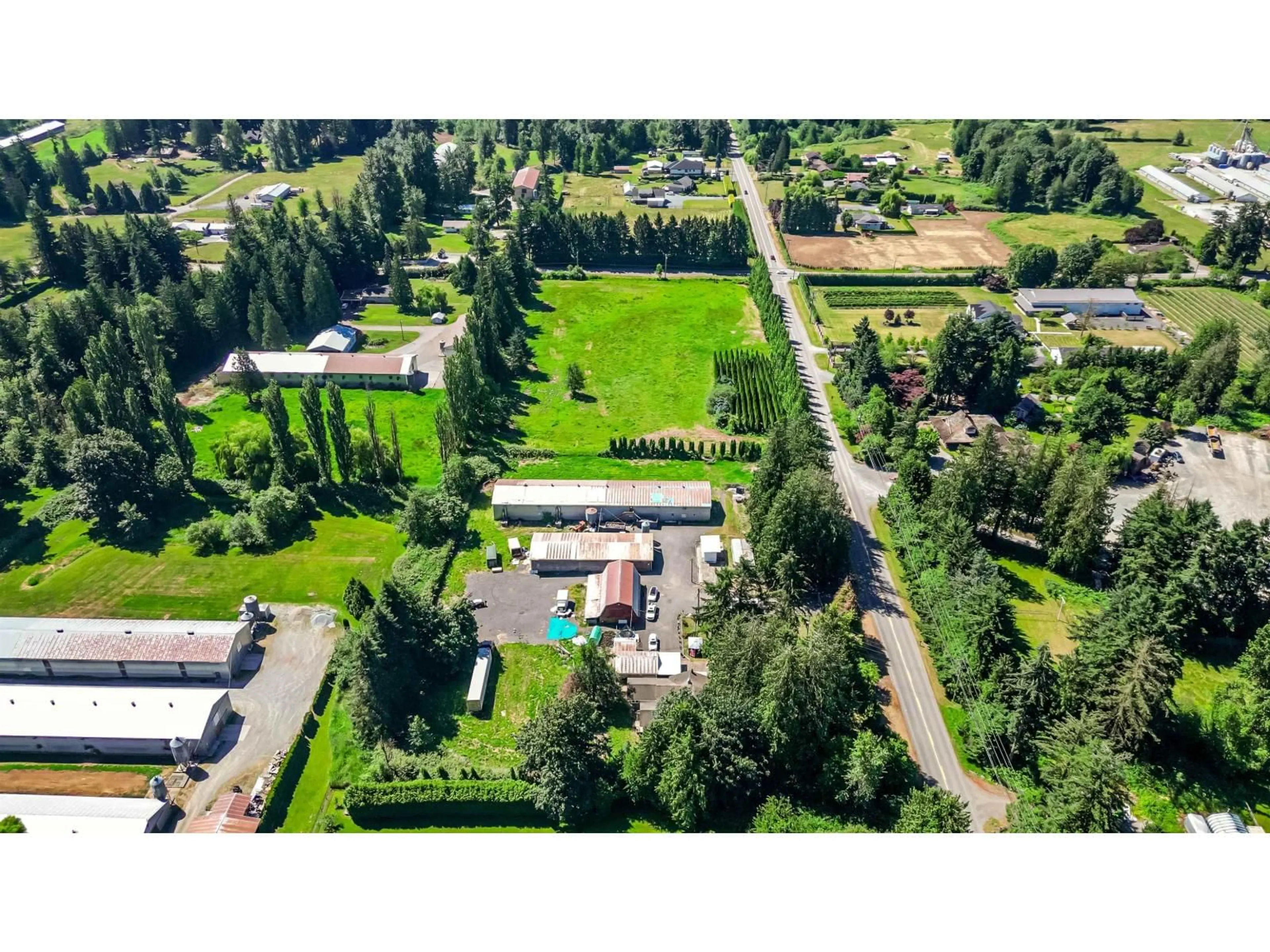 A pic from outside/outdoor area/front of a property/back of a property/a pic from drone, unknown for 5950 BRADNER ROAD, Abbotsford British Columbia V4X2C7