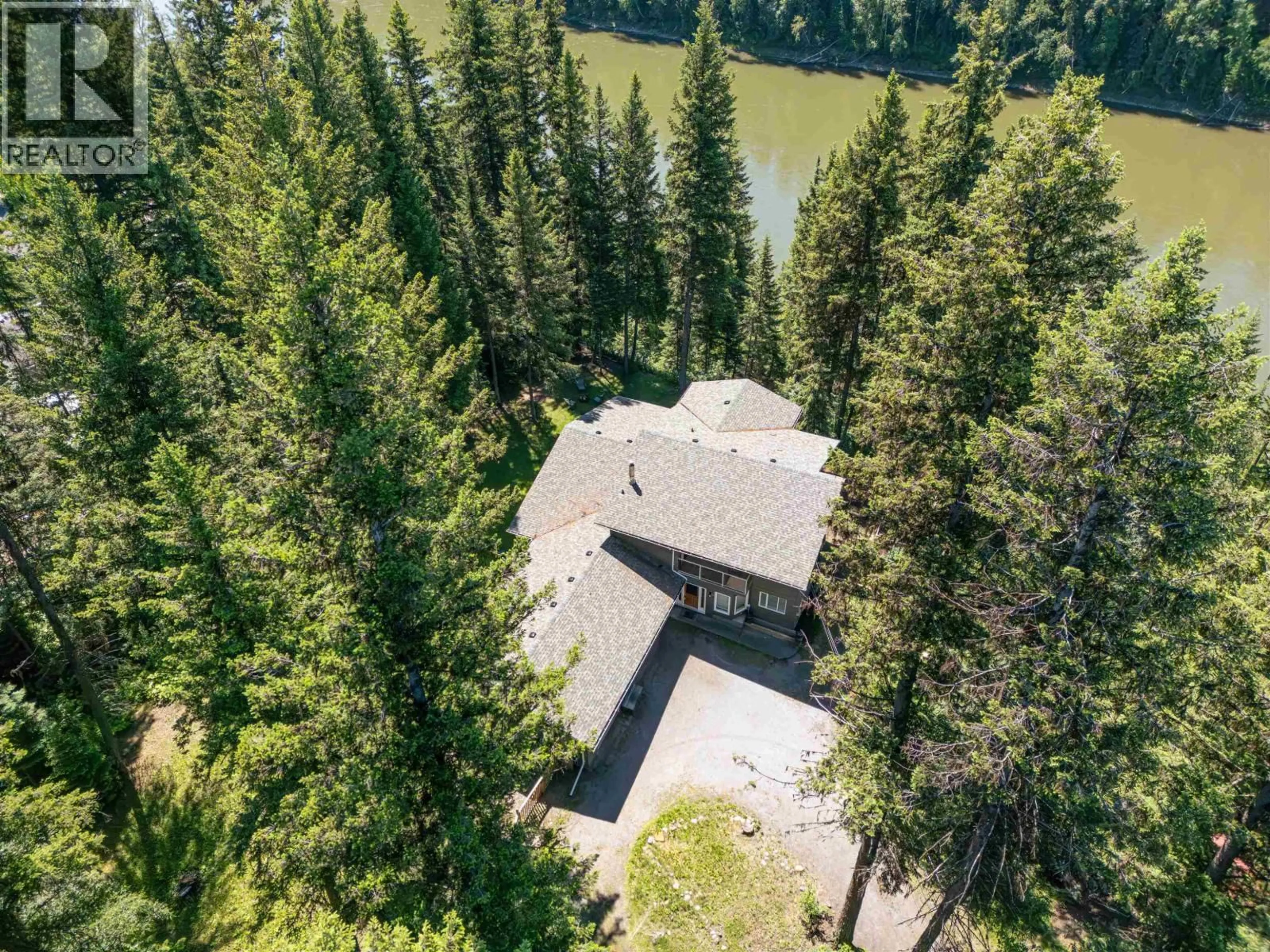 A pic from outside/outdoor area/front of a property/back of a property/a pic from drone, forest/trees view for 6201 BENCH DRIVE, Prince George British Columbia V2K4Y9