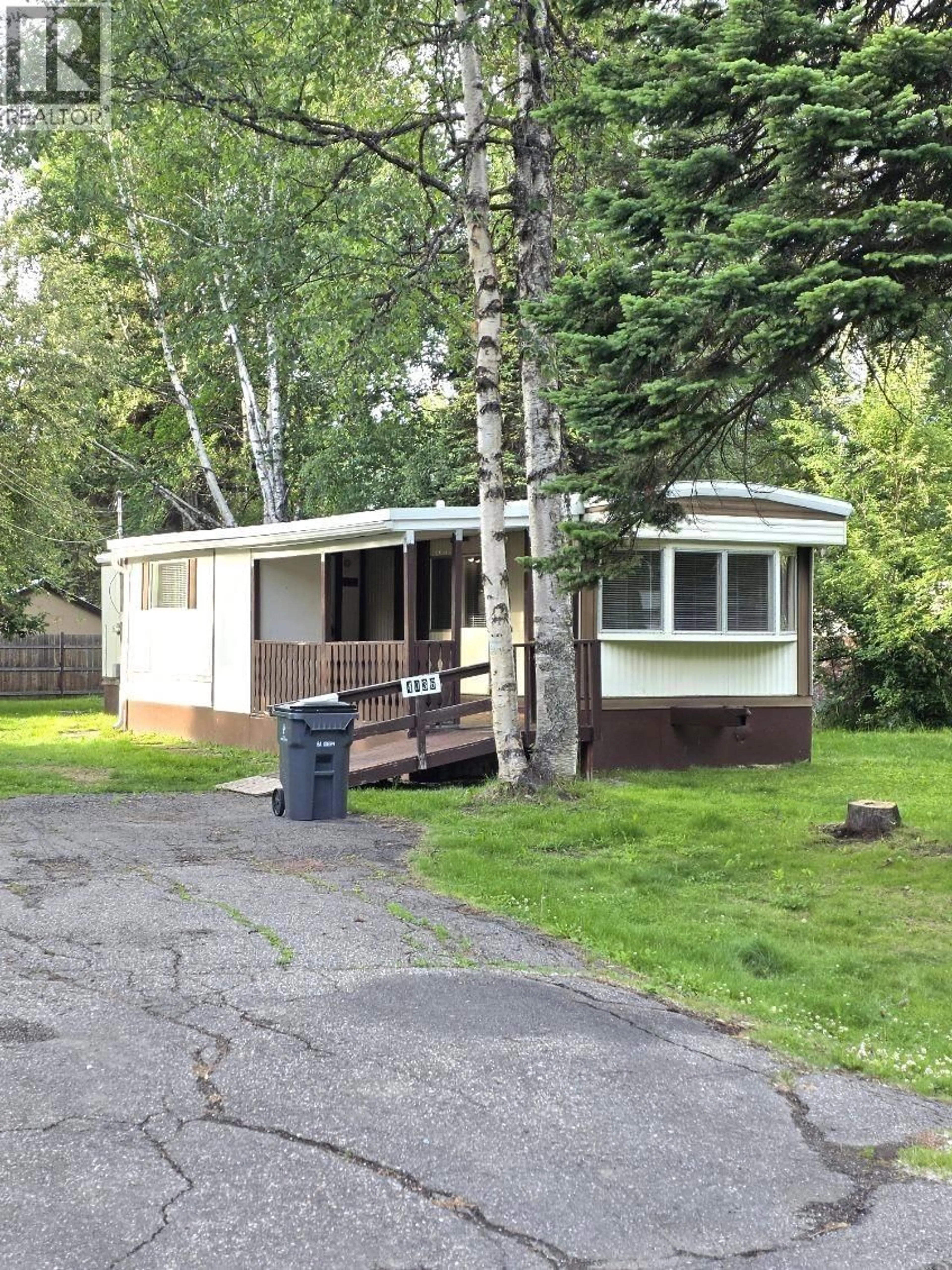 Home with vinyl exterior material, street for 4036 JADE DRIVE, Prince George British Columbia V2K3M2