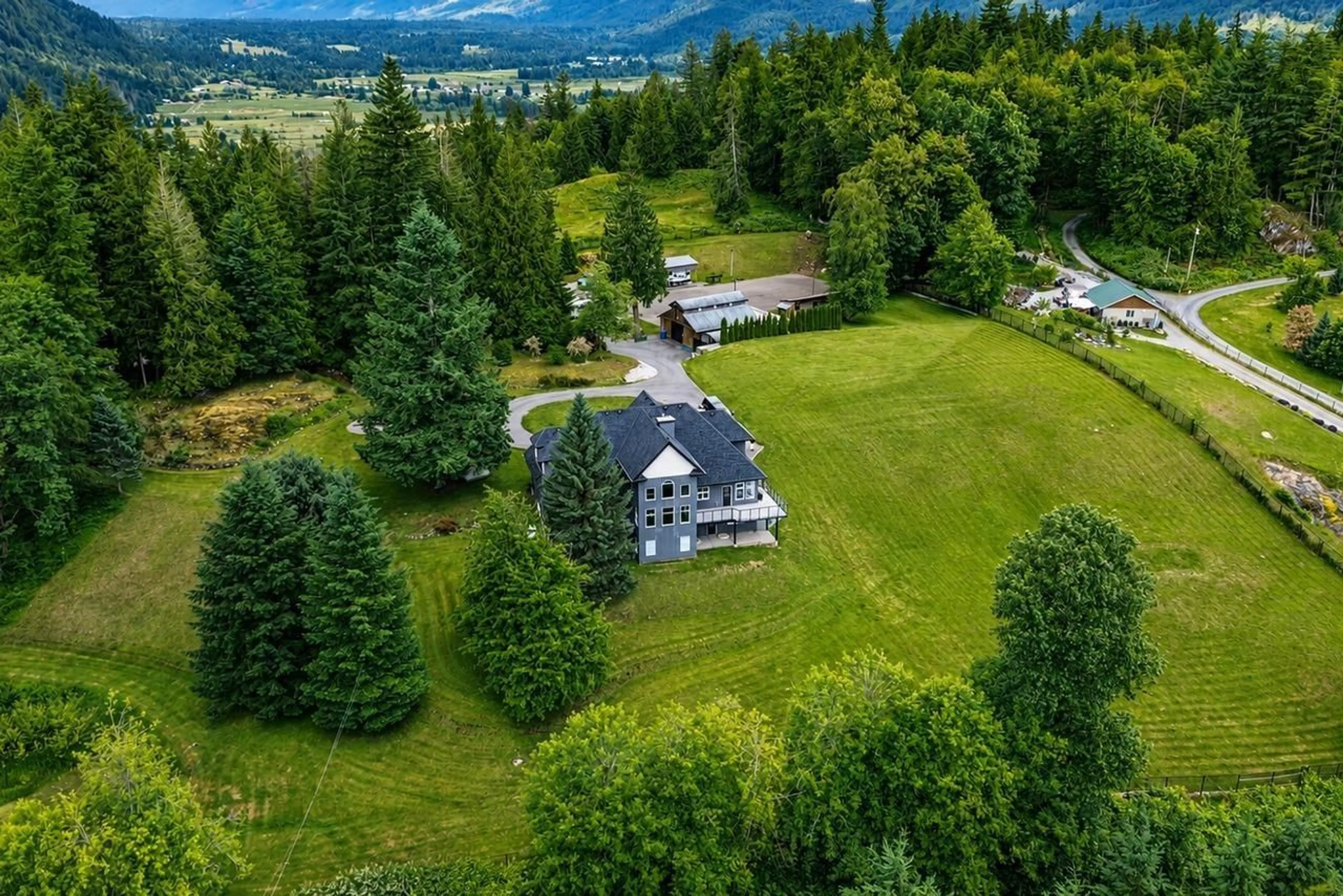 A pic from outside/outdoor area/front of a property/back of a property/a pic from drone, mountain view for 10228 STAVE LAKE ROAD, Mission British Columbia V2V0B5