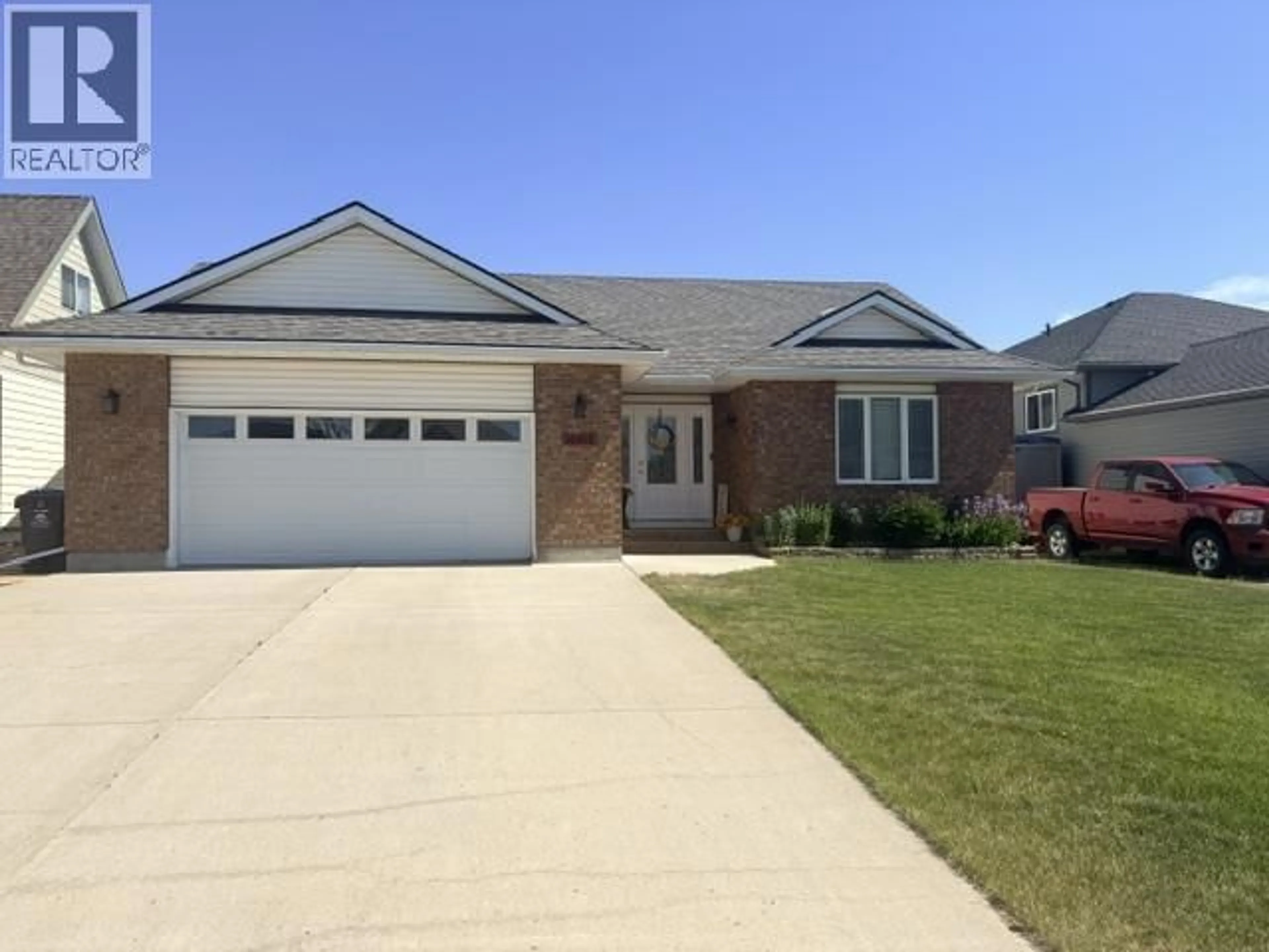 Home with brick exterior material, street for 10915 88A STREET, Fort St. John British Columbia V1J7G2