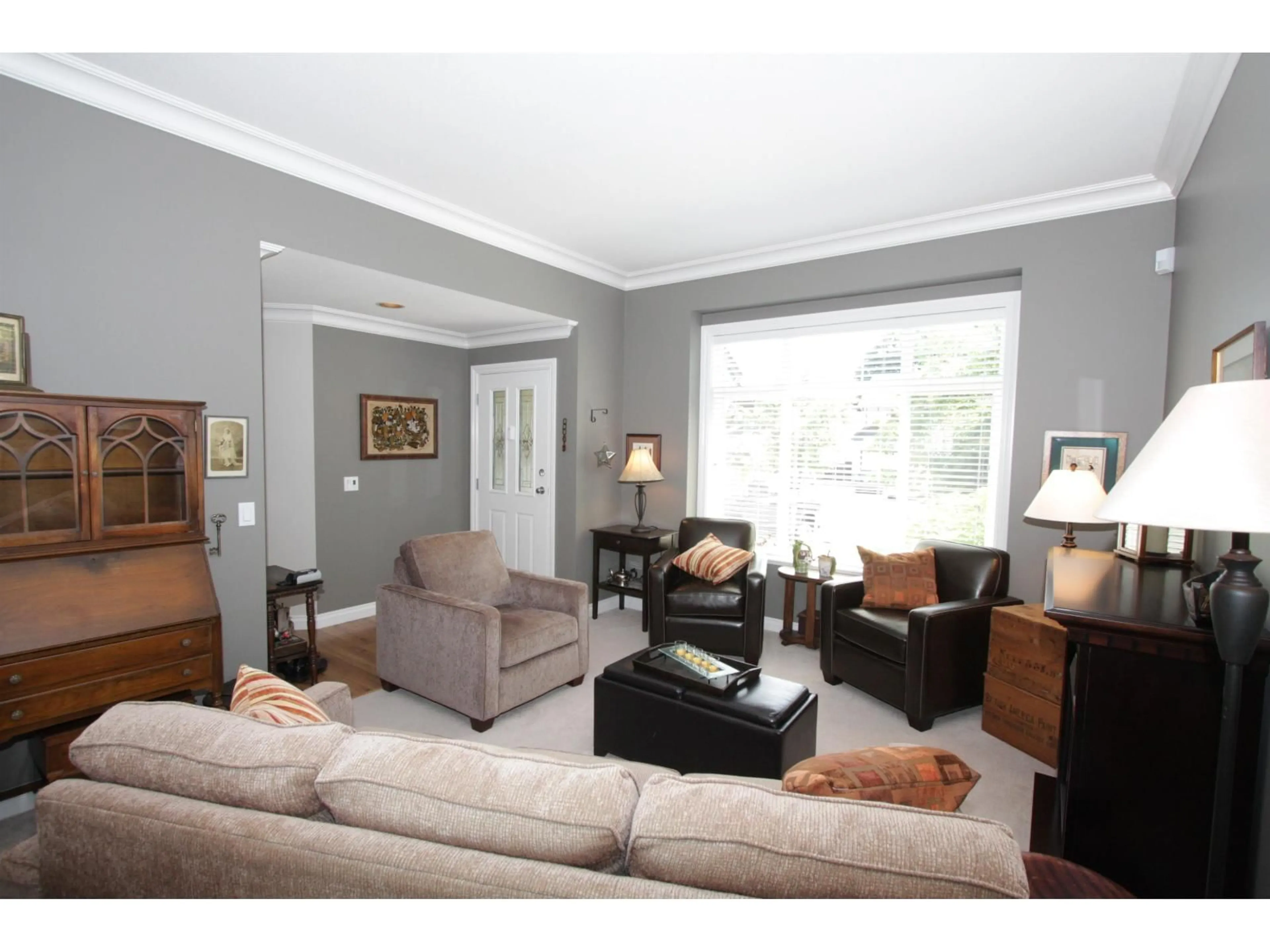 Living room with furniture, wood/laminate floor for 30688 STEELHEAD COURT, Abbotsford British Columbia V2T6V1