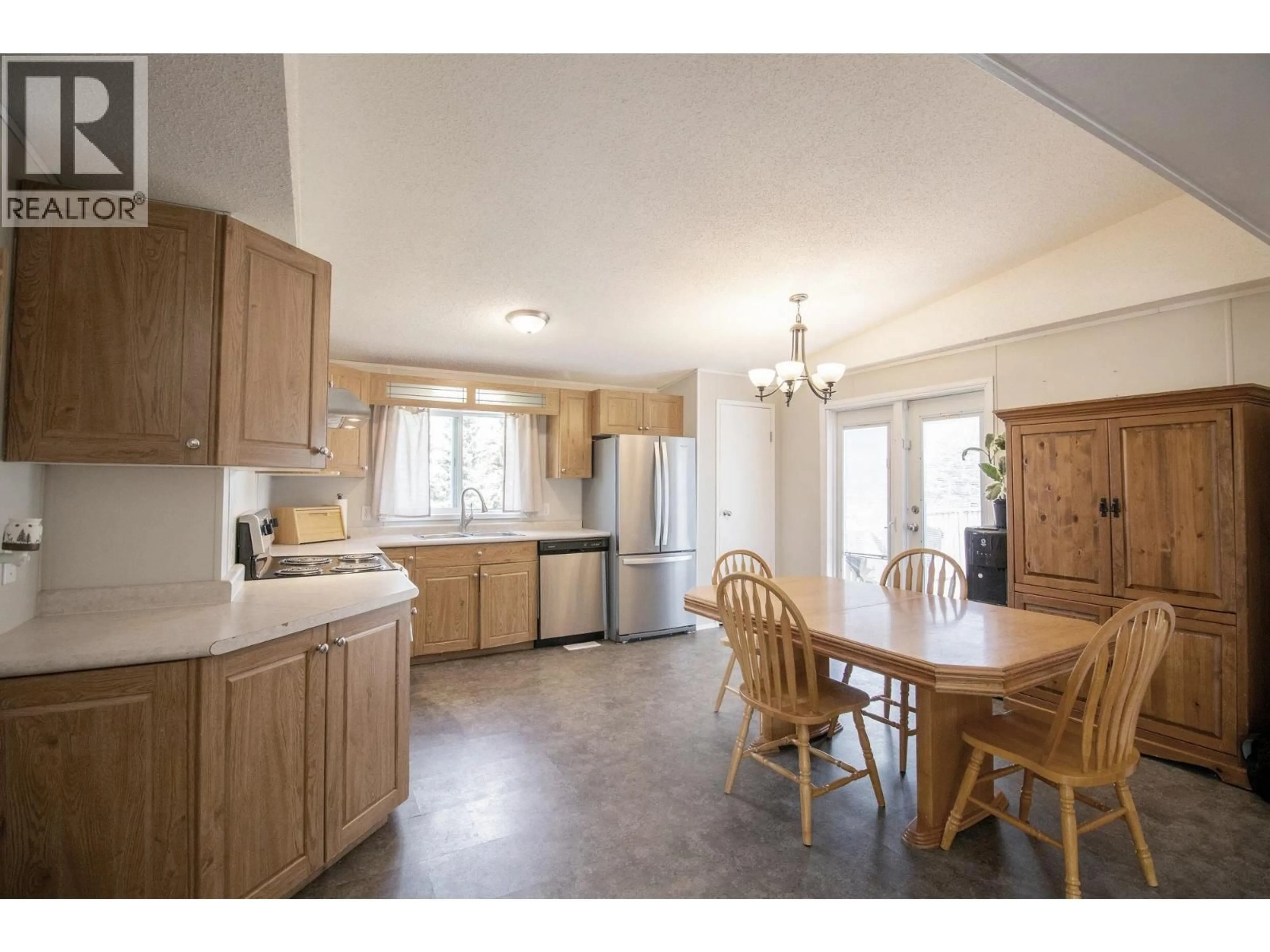 Open concept kitchen, unknown for 10439 102 STREET, Taylor British Columbia V0C2K0