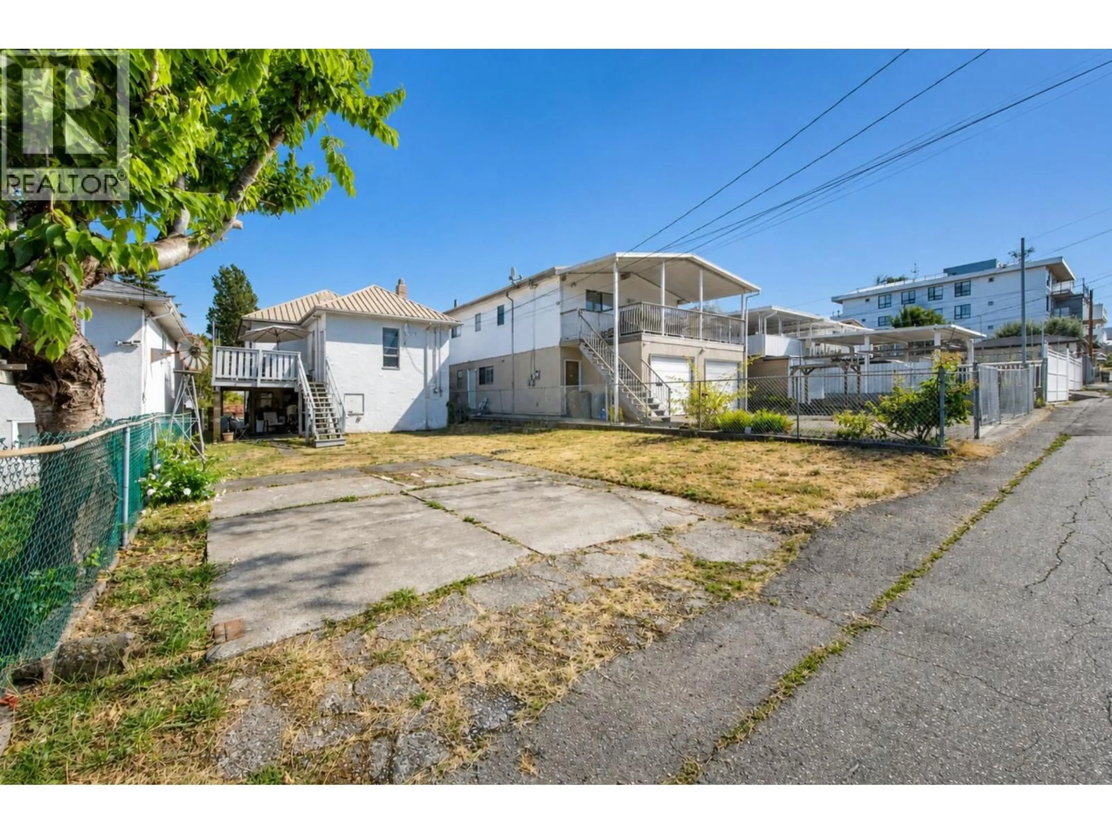 A pic from outside/outdoor area/front of a property/back of a property/a pic from drone, street for 2354 33RD AVENUE, Vancouver British Columbia V5R2S3