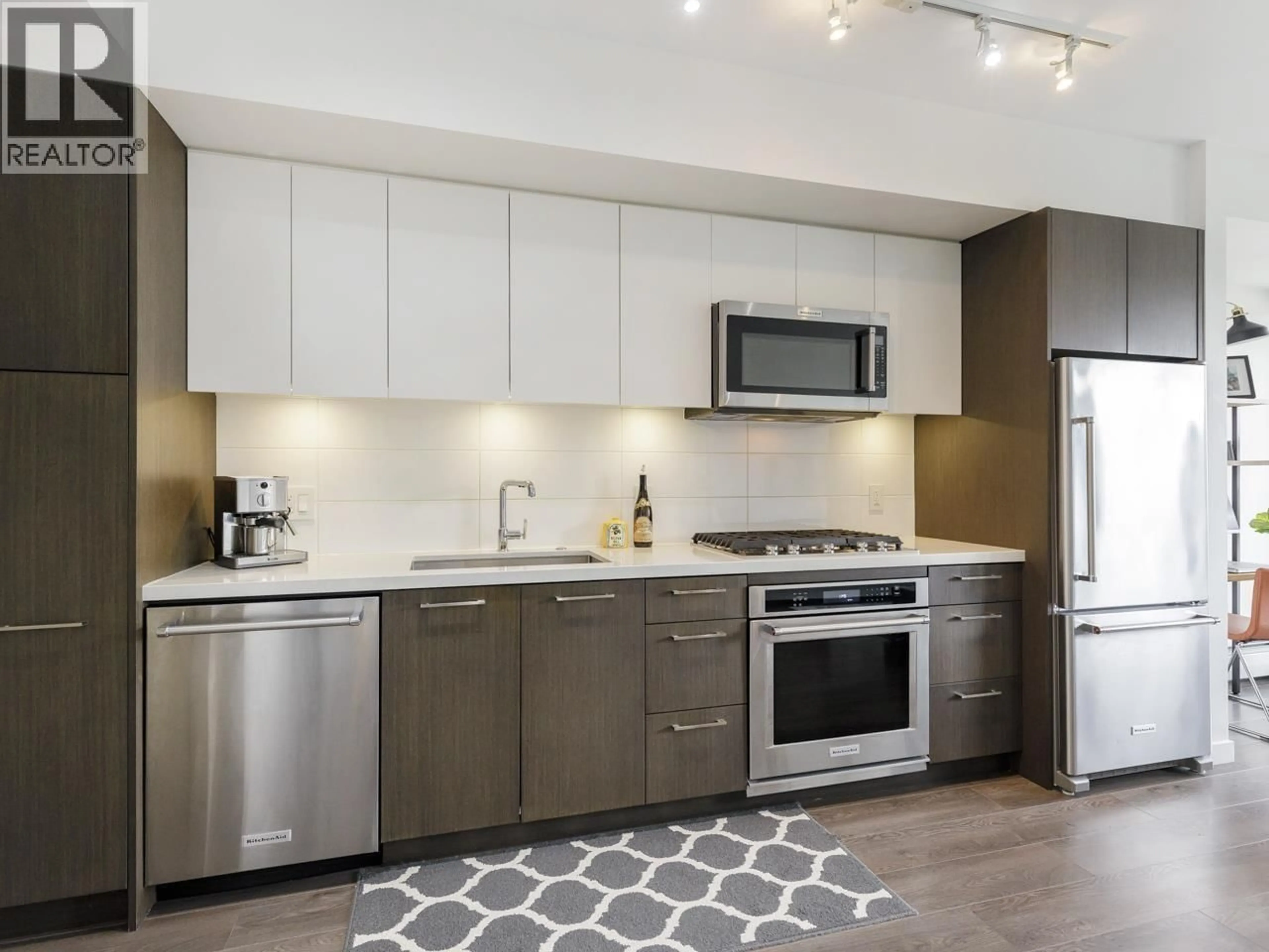 Open concept kitchen, unknown for 411 - 417 GREAT NORTHERN WAY, Vancouver British Columbia V5T0G7
