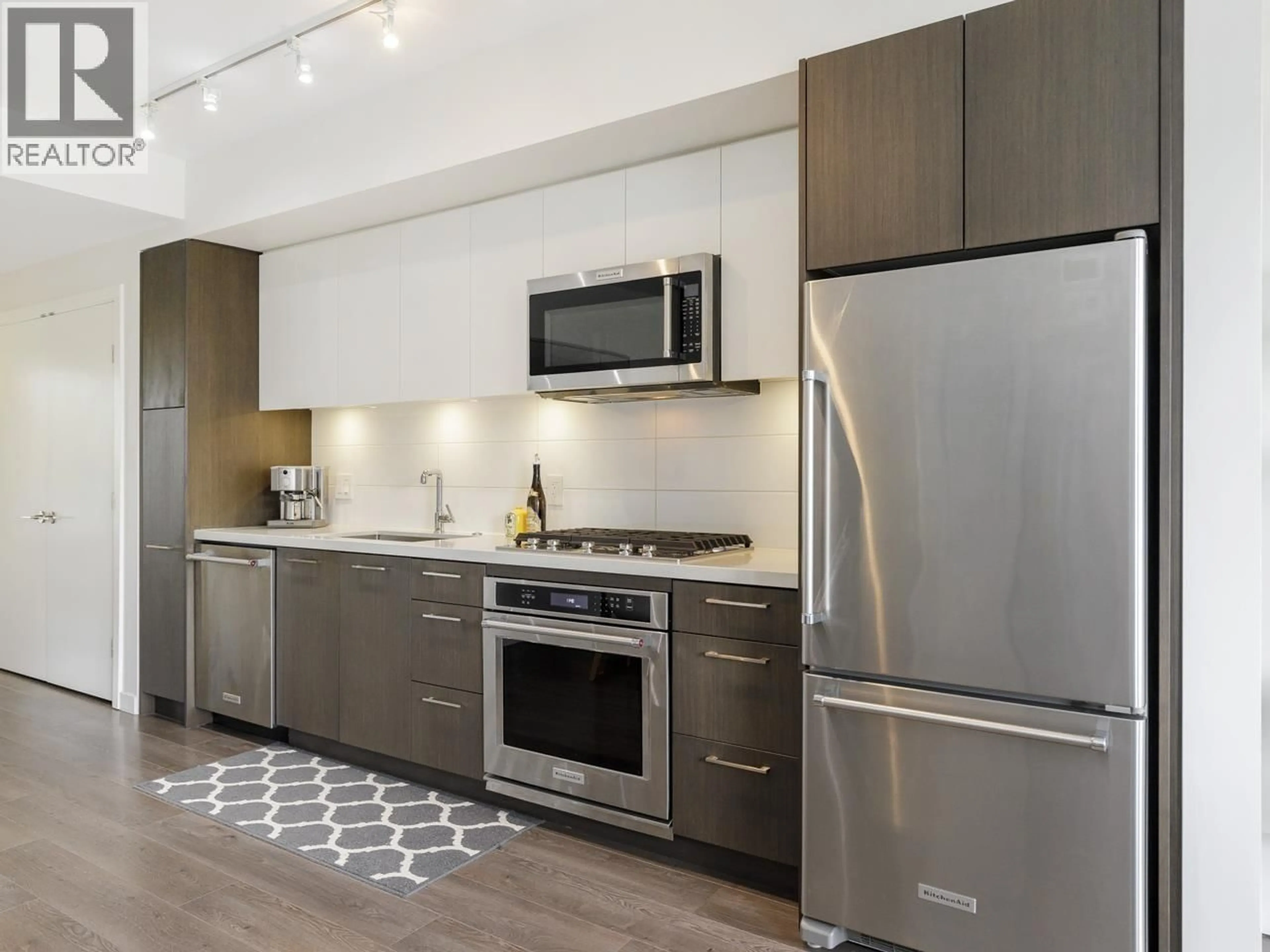 Open concept kitchen, unknown for 411 - 417 GREAT NORTHERN WAY, Vancouver British Columbia V5T0G7
